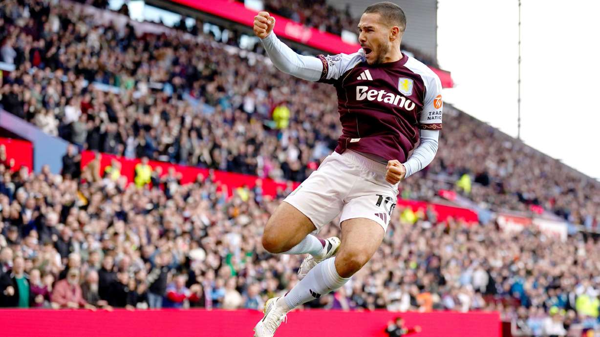 Aston Villa's Emi Buendia celebrates scoring his team's third goal during the English Premier League soccer match between Aston Villa and Fulham at Villa Park, Birmingham, England, Sunday, Sept. 28, 2025.