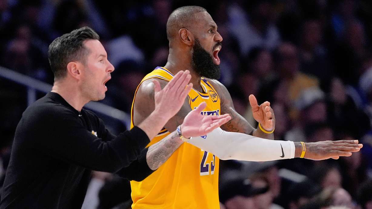 FILE - Los Angeles Lakers head coach JJ Redick, left, and forward LeBron James yell to the referees during the second half of an NBA basketball game against the Golden State Warriors Thursday, April 3, 2025, in Los Angeles.