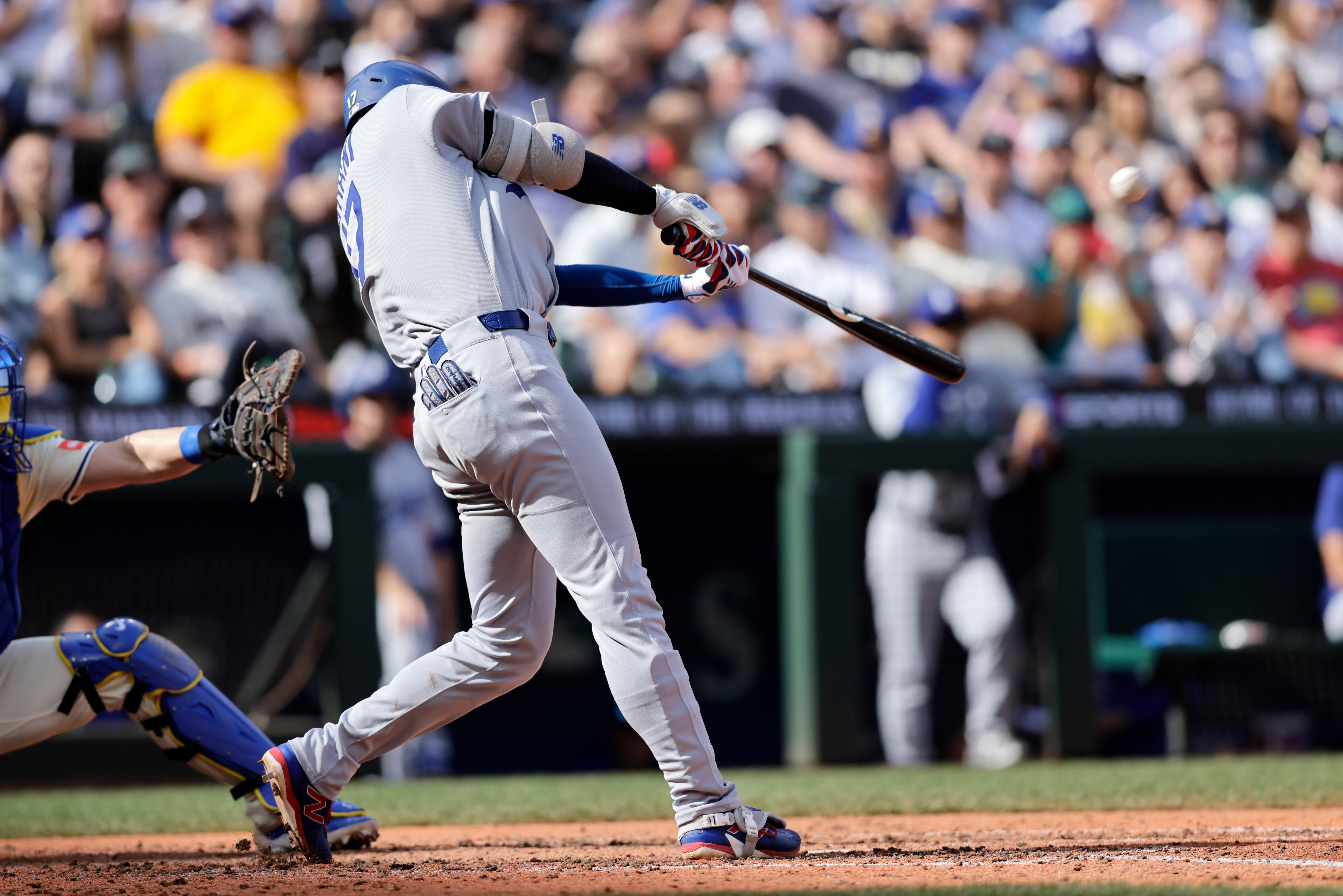 Los Angeles Dodgers' Shohei Ohtani hits a solo home run off Seattle Mariners pitcher Caleb Ferguson during the seventh inning of a baseball game Sunday, Sept. 28, 2025, in Seattle.