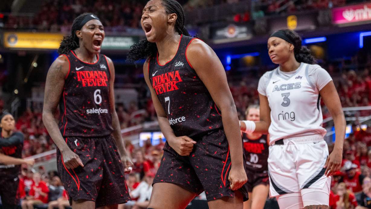 Indiana Fever forward Aliyah Boston (7) reacts after being fouled during the second half of Game 4 of a WNBA basketball playoff semifinals series against the Las Vegas Aces in Indianapolis, Sunday, Sept. 28, 2025.