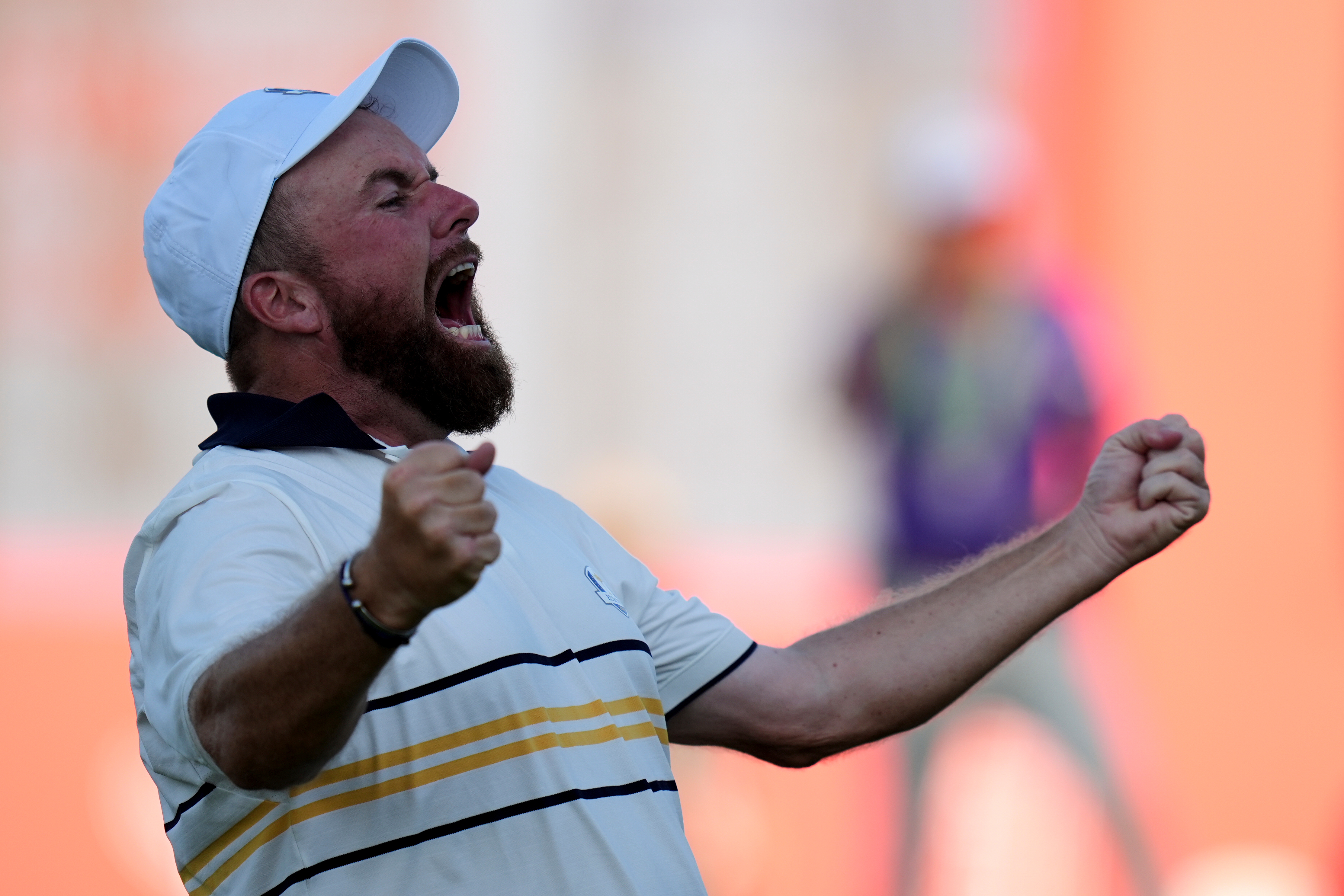 Europe's Shane Lowry celebrates after making the winning putt putt on the 18th hole during their singles match on the Bethpage Black golf course at the Ryder Cup golf tournament, Sunday, Sept. 28, 2025, in Farmingdale, N.Y.