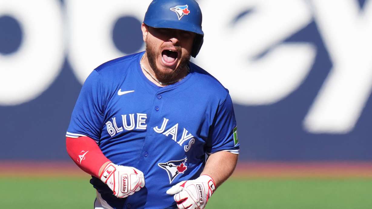 Toronto Blue Jays' Alejandro Kirk rounds the bases after hitting a grand slam against the Tampa Bay Rays during first-inning baseball game action in Toronto, Sunday, Sept. 28, 2025.