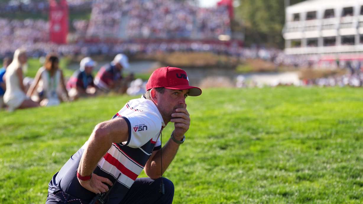 United States captain Keegan Bradley watches on the 16th hole during their singles match on the Bethpage Black golf course at the Ryder Cup golf tournament, Sunday, Sept. 28, 2025, in Farmingdale, N.Y.
