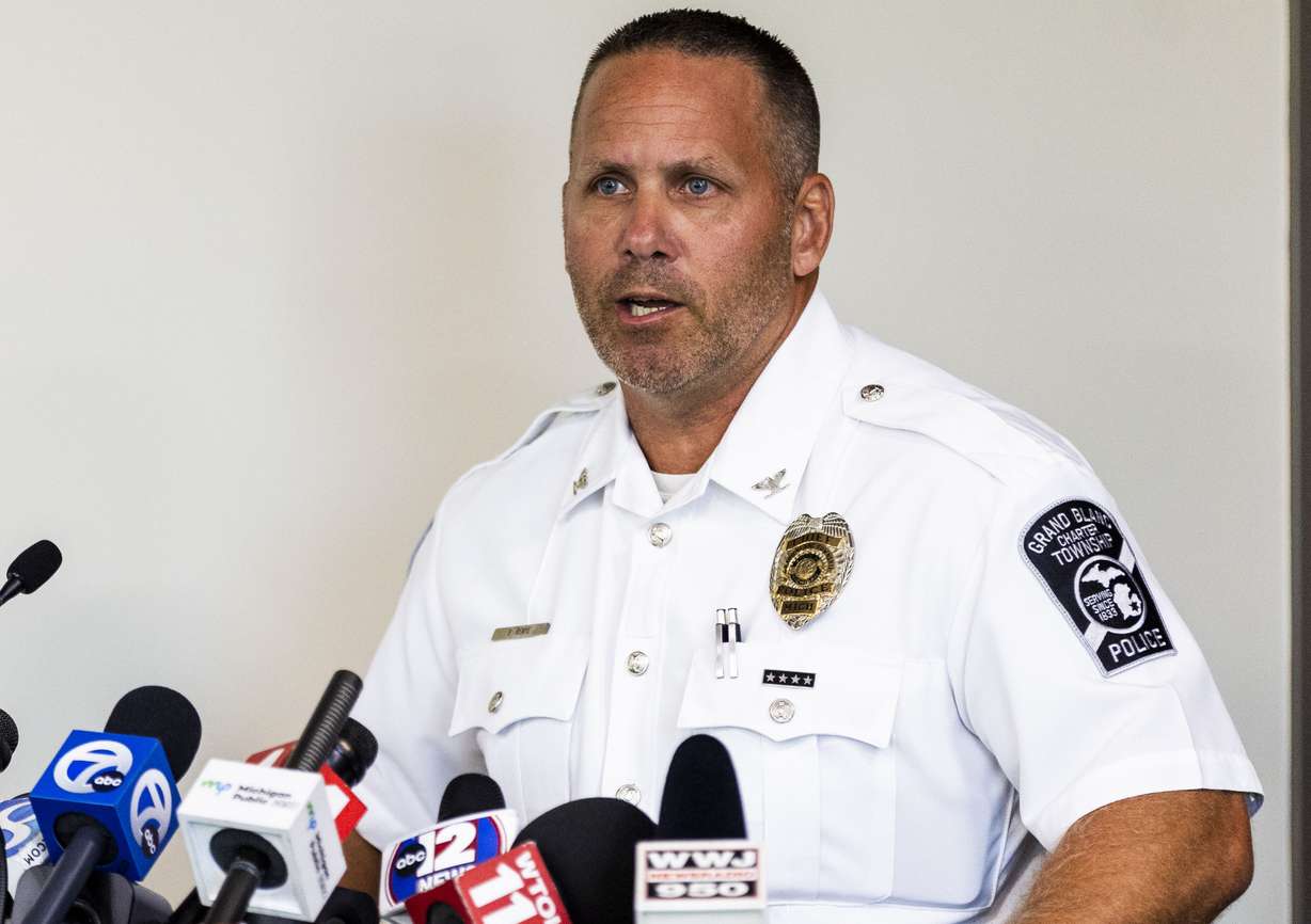 Grand Blanc Township Police Chief William Renye speaks at a press conference after a shooting and fire at a meetinghouse of The Church of Jesus Christ of Latter-day Saints, at the police station in Grand Blanc Township, Mich., on Sunday.