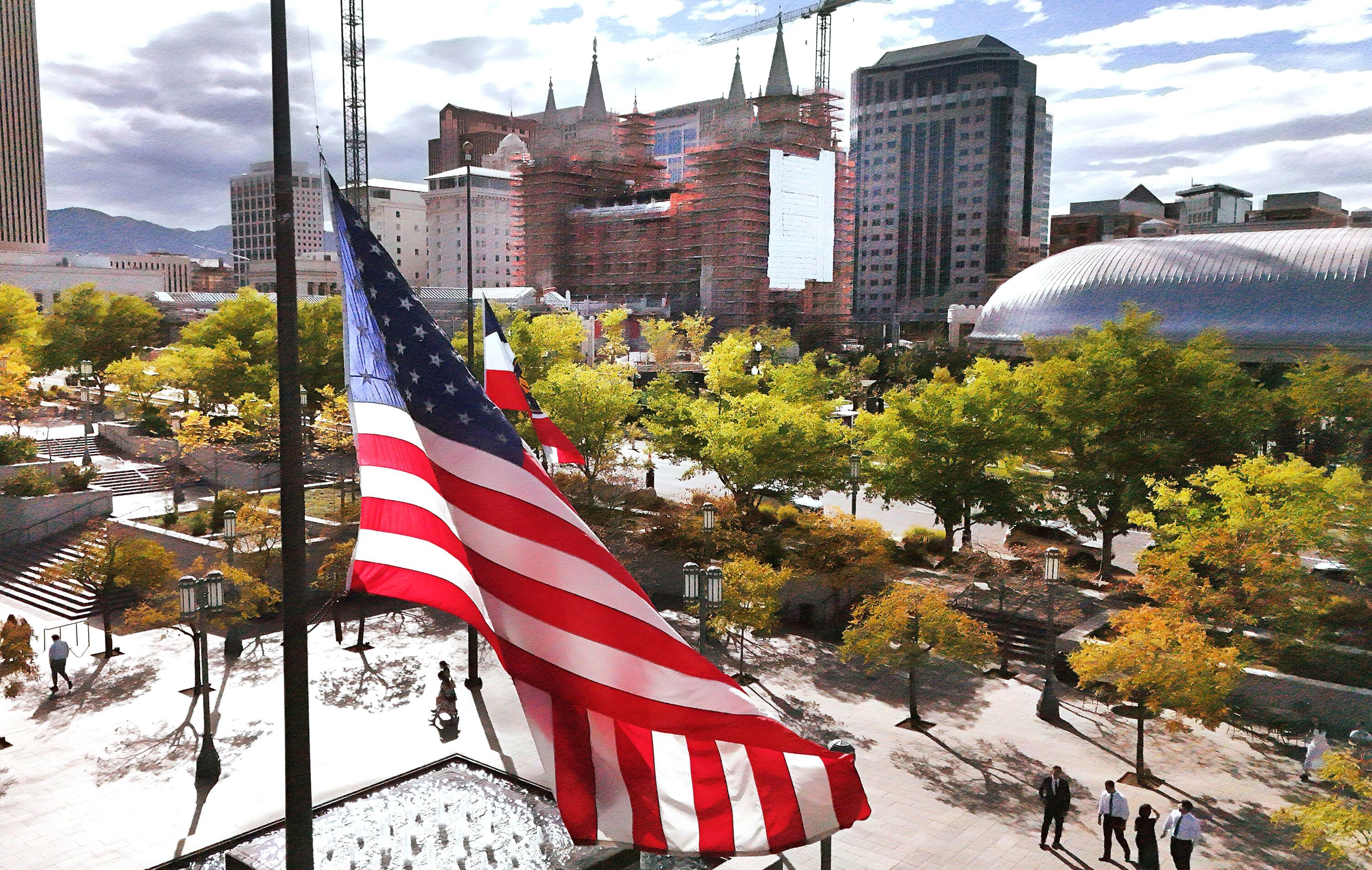 An American flag flies at half-mast after President Russell M. Nelson passed away at 101 years old in Salt Lake City on Sunday.
