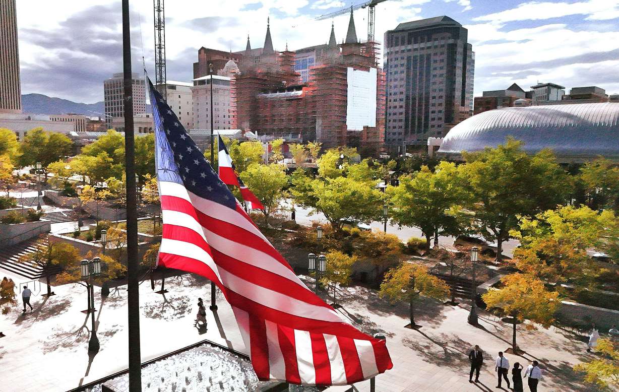 An American flag flies at half-mast after President Russell M. Nelson passed away at 101 years old in Salt Lake City on Sunday.