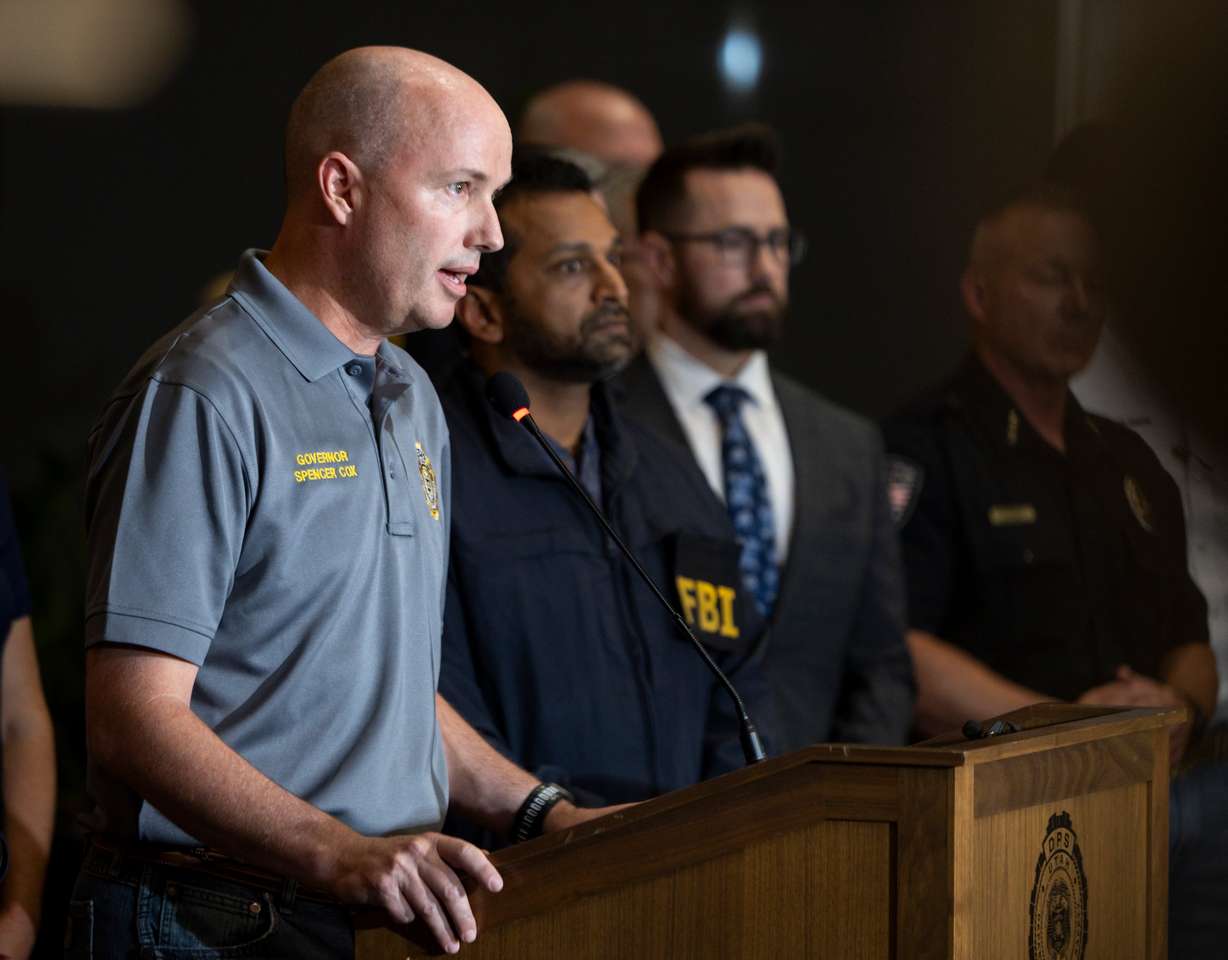 Utah Gov. Spencer Cox speaks during a press conference while joined by Beau Mason, commissioner of the Utah Department of Public Safety, FBI Director Kash Patel and others about the shooting death of Charlie Kirk at Utah Valley University in Orem on Sept. 11.