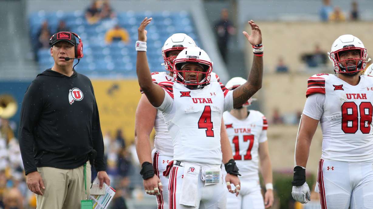 Utah players react during the second half of an NCAA college football game against West Virginia, Saturday, Sept, 27, 2025, in Morgantown, W.Va.