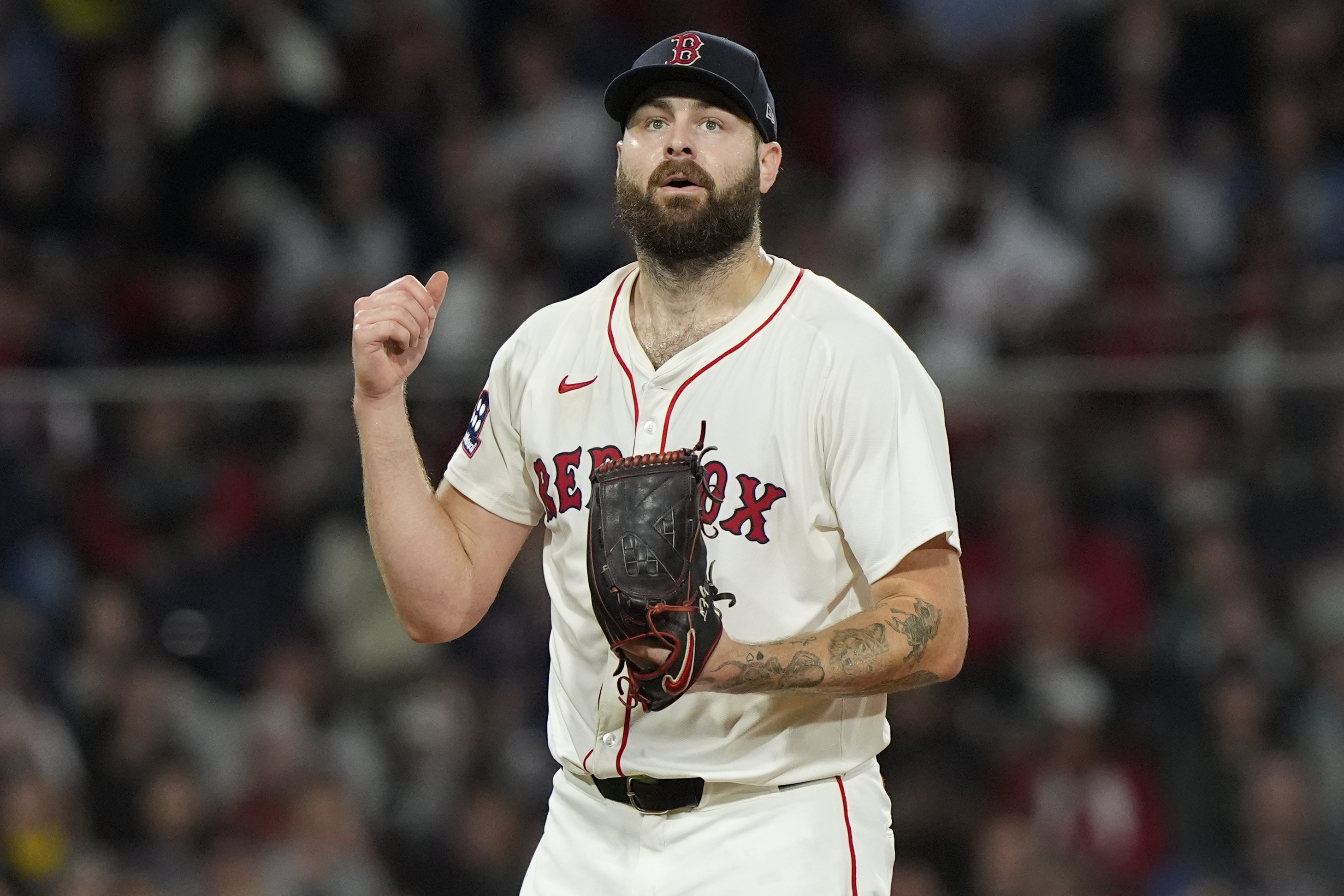 Boston Red Sox starting pitcher Lucas Giolito reacts after striking out Athletics Lawrence Butler with bases loaded in the third inning in of a baseball game against the Athletics, Wednesday, Sept. 17, 2025, in Boston. 