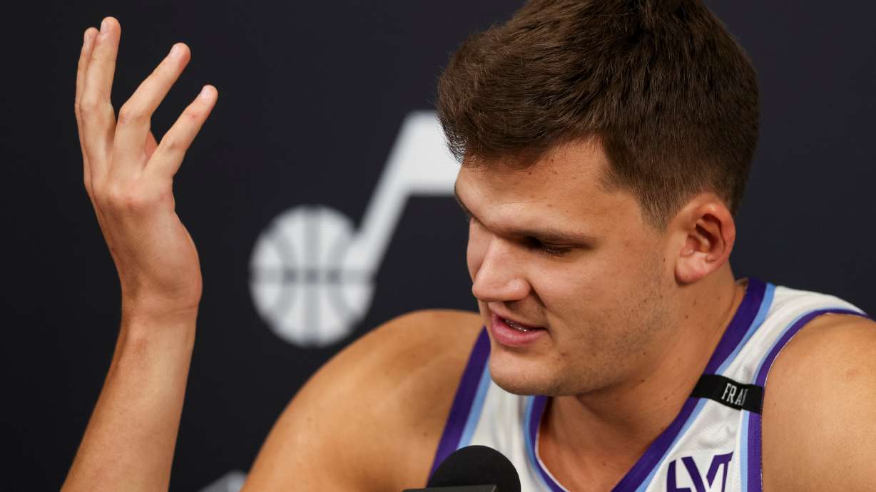 Utah Jazz center Walker Kessler (24) reacts while talking about his contract situation during the Utah Jazz media day at the Zions Bank Basketball Campus in Salt Lake City on Monday, Sept. 29, 2025.