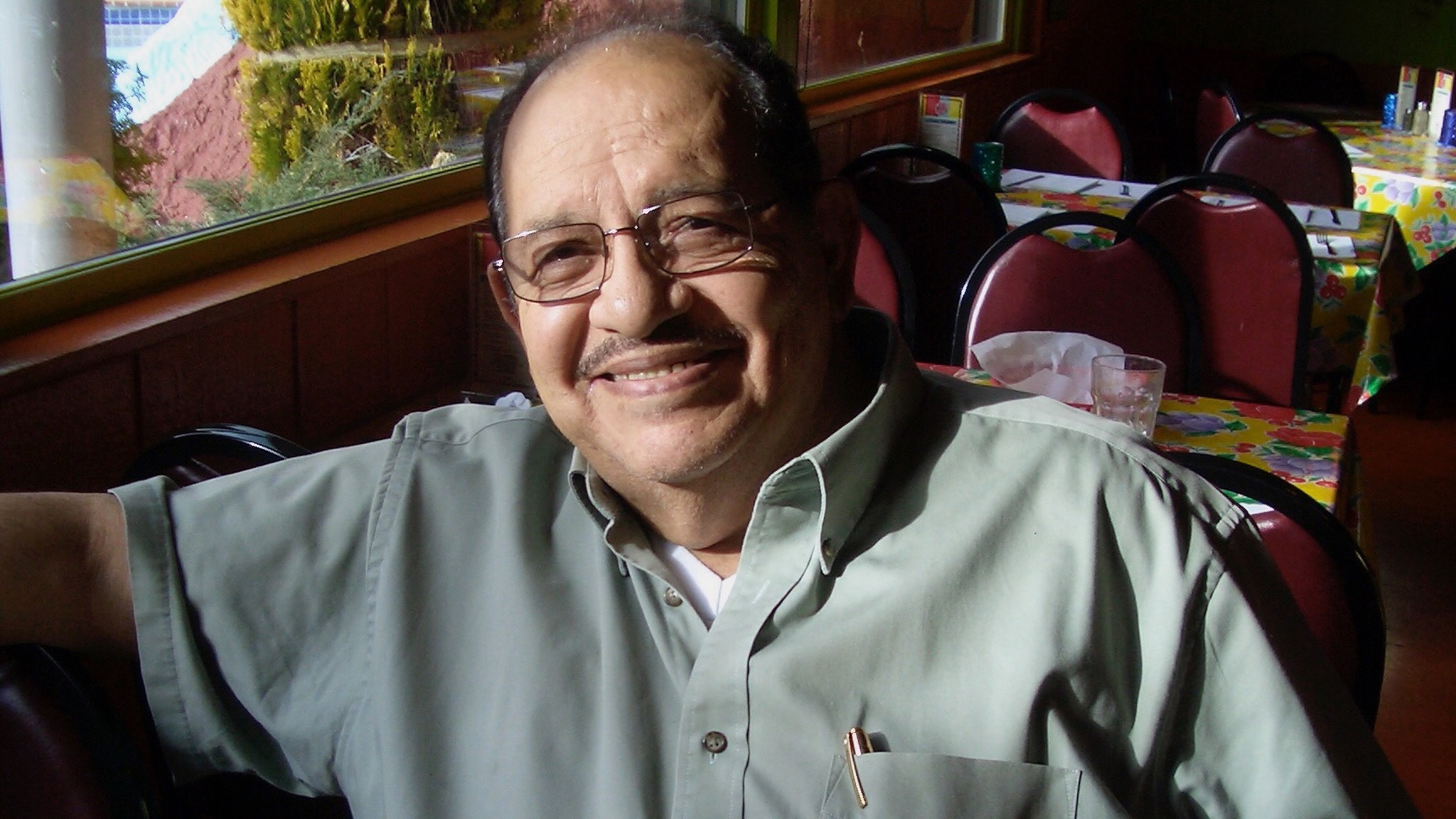Ramon Cardenas Sr., who founded Red Iguana with his late wife Maria in 1985, died on Friday. He's pictured in a photo at Red Iguana's North Temple location last year.