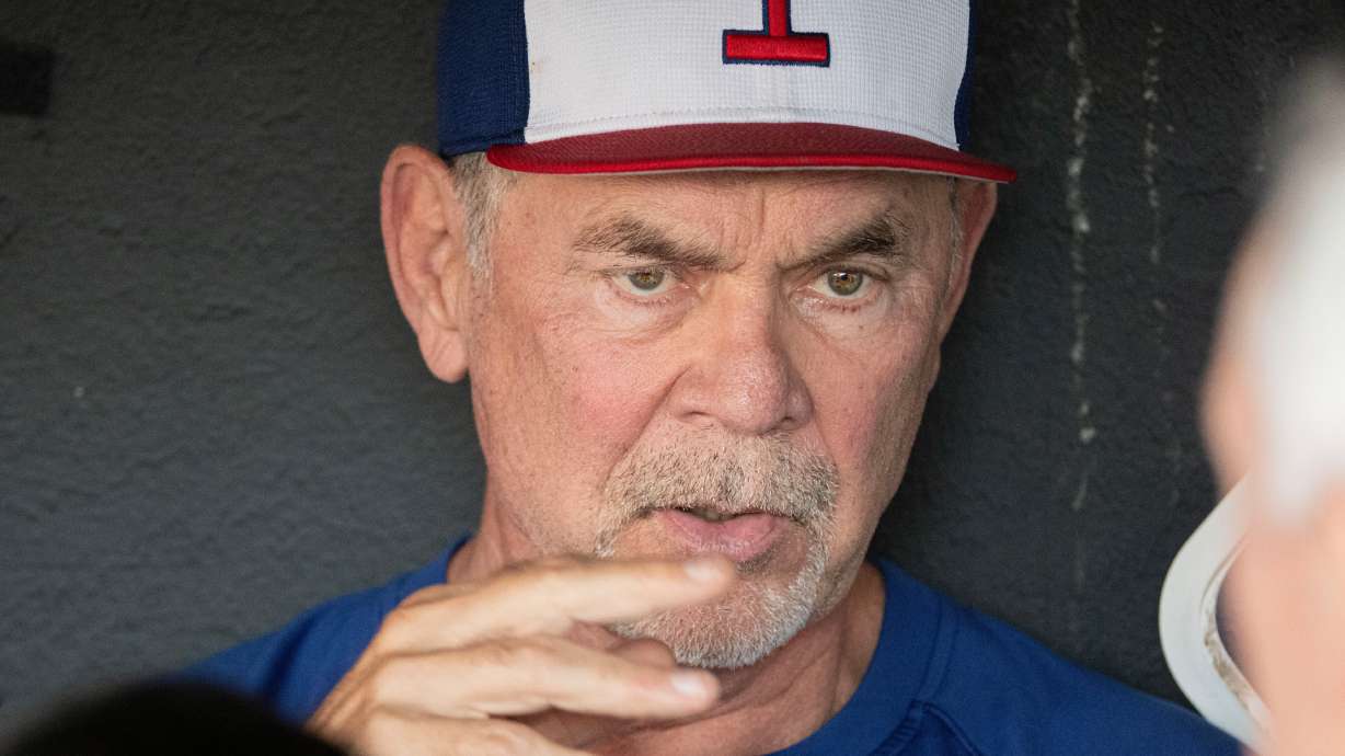 Texas Rangers manager Bruce Bochy speaks with reporters before the start of a baseball game against the Cleveland Guardians, Friday, Sept. 26, 2025, in Cleveland.