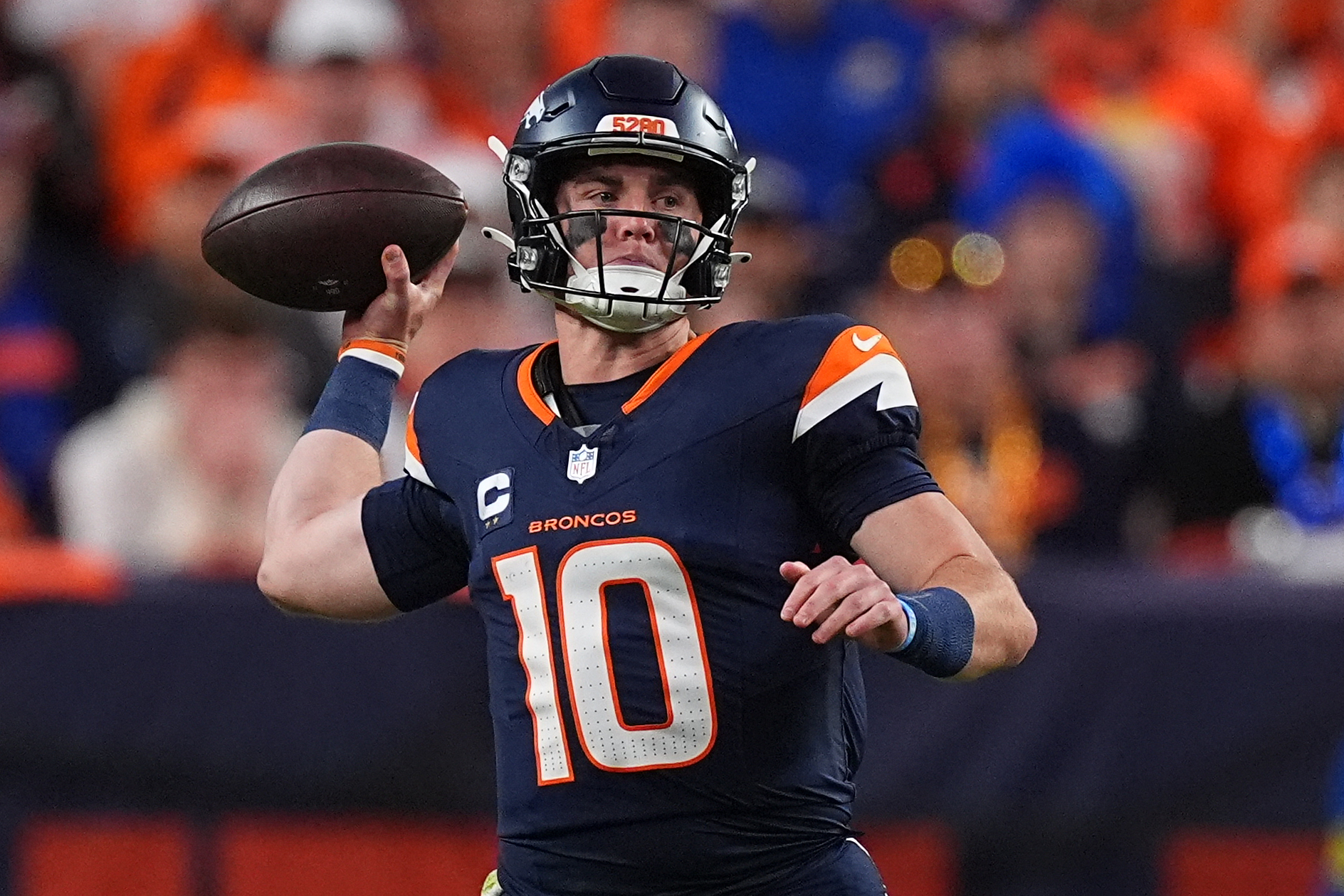 Denver Broncos quarterback Bo Nix (10) throws against the Cincinnati Bengals during the first half of an NFL football game Monday, Sept. 29, 2025, in Denver. 
