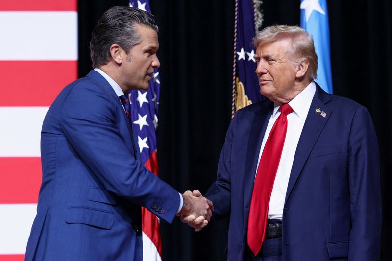 President Donald Trump with Defense Secretary Pete Hegseth at Marine Corps Base Quantico in Quantico, Va., Tuesday. Trump echoed much of what Hegseth told senior military leaders.