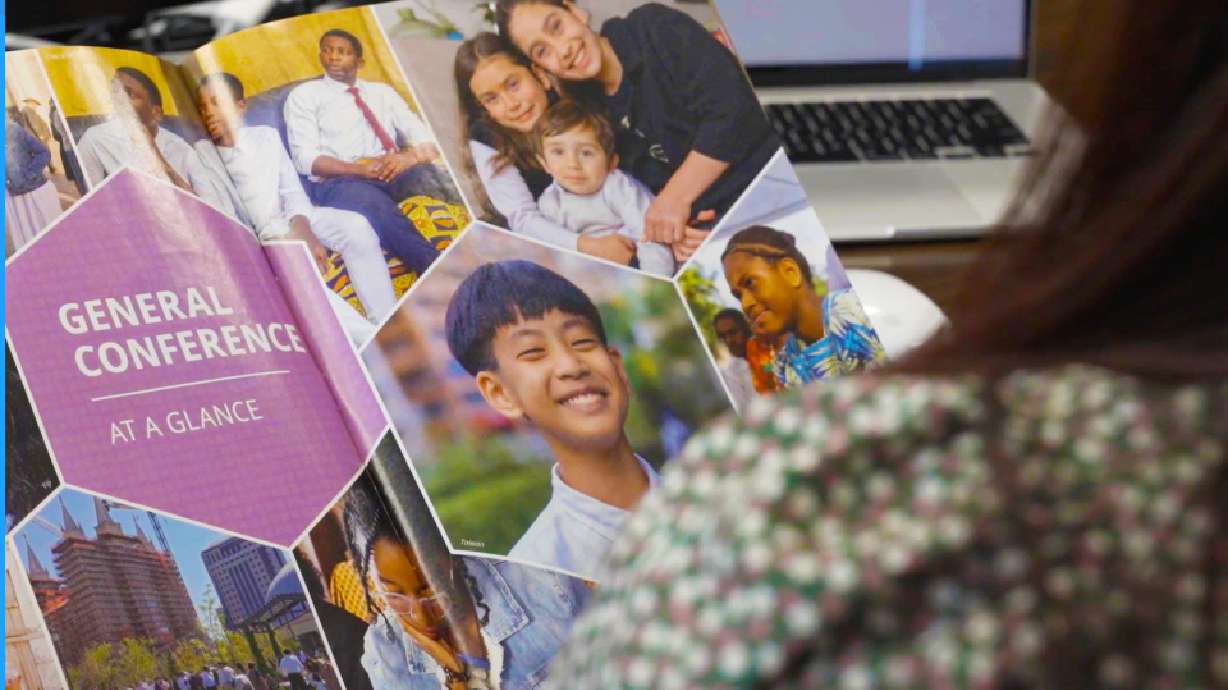 A magazine staff member reviews pages from a conference edition of a church magazine. The magazine team is highlighted in a new “Behind the Scenes of General Conference” video from The Church of Jesus Christ of Latter-day Saints.