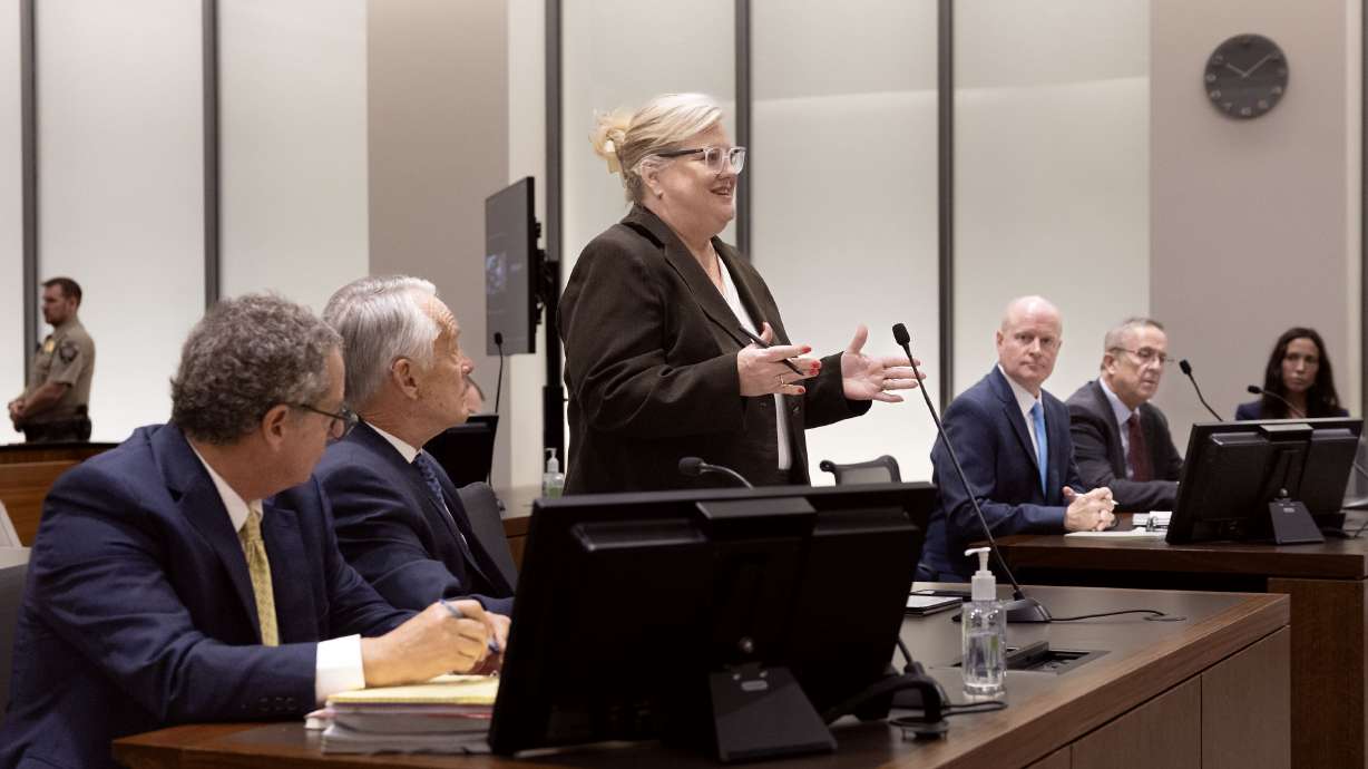 Defending attorneys listen as attorney Kathryn Nester speaks to the judge in a hearing for Tyler Robinson, the man accused of killing Charlie Kirk, in Provo on Sept. 29, 2025. At right are prosecutors Chad Grunander and Jeff Gray.