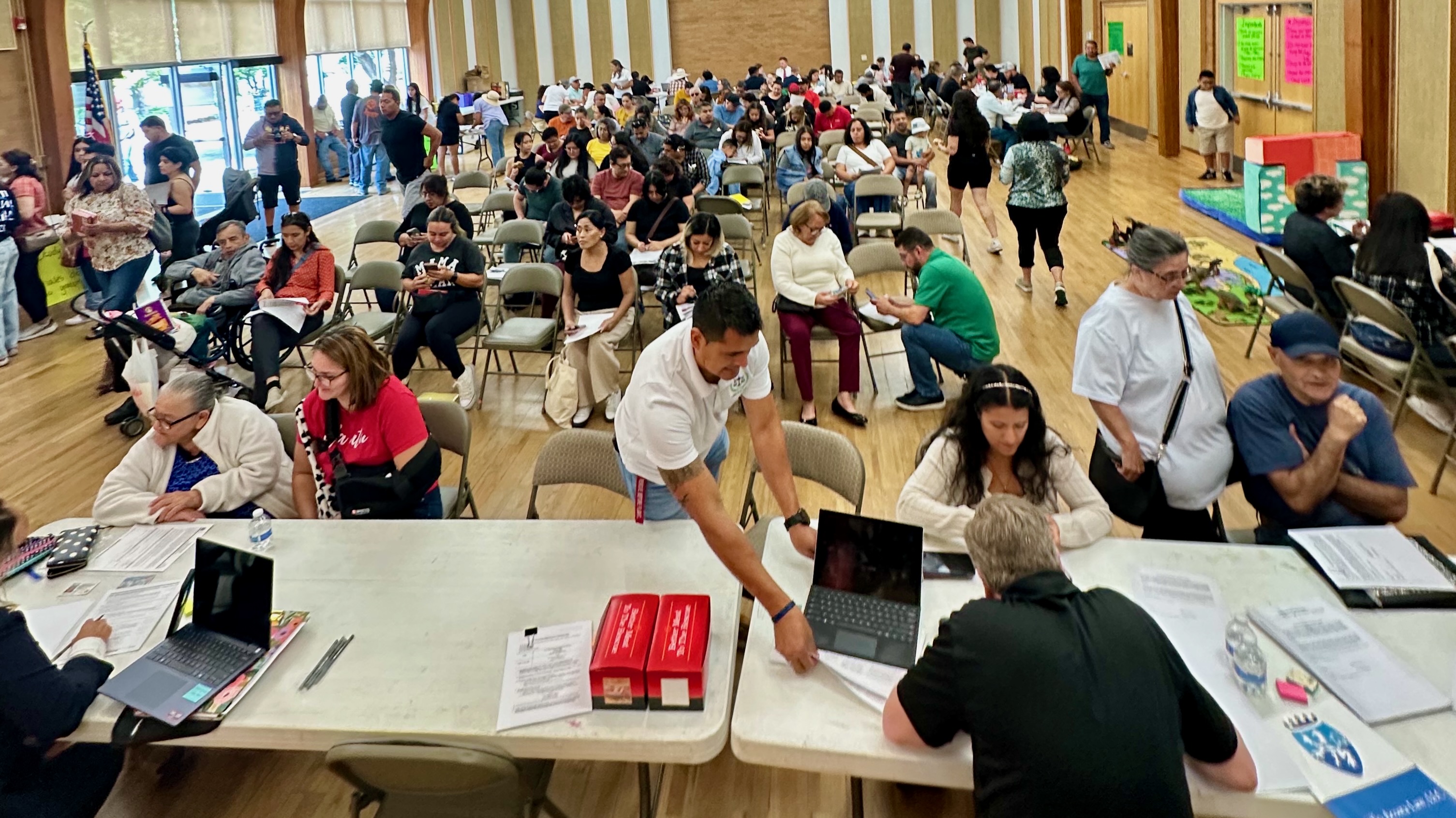 Immigrants seek help applying for U.S. citizenship at an event on Sept. 20 in South Salt Lake. Utah attorneys say that legally immigrating to the United States can be difficult, and in some cases, even impossible.