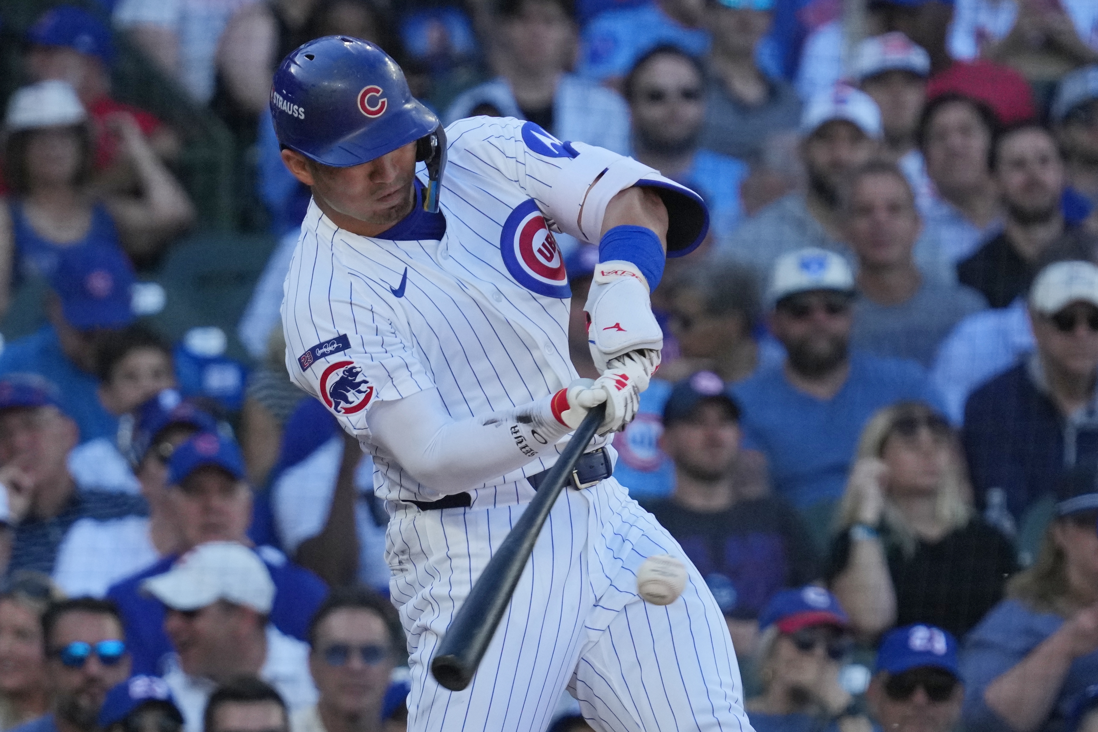 Chicago Cubs' Seiya Suzuki- hits a home run during the fifth inning of Game 1 of a National League wild card baseball game against the San Diego Padres Tuesday, Sept. 30, 2025, in Chicago.