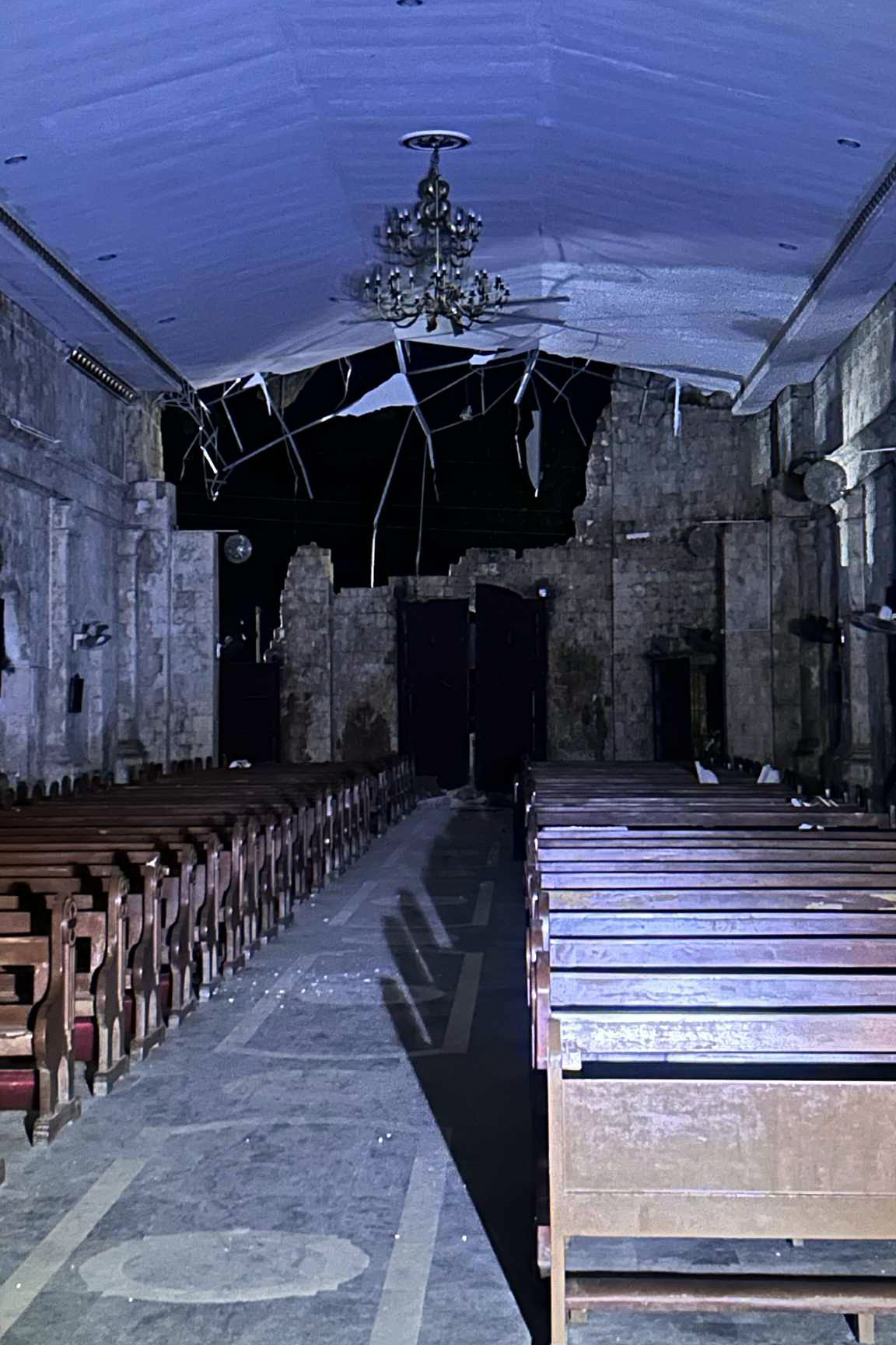 Damage outside the Archdiocesan Shrine of Santa Rosa de Lima in Cebu City on Tuesday. A strong offshore earthquake with a preliminary magnitude of 6.9 shook the central Philippines, killing at least 31 people.