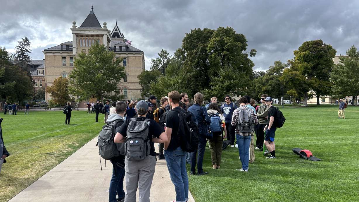 Utah State University's Old Main building, seen in the background, was temporarily evacuated on Tuesday due to a "suspicious package" on the premises ahead of a planned Turning Point USA event.