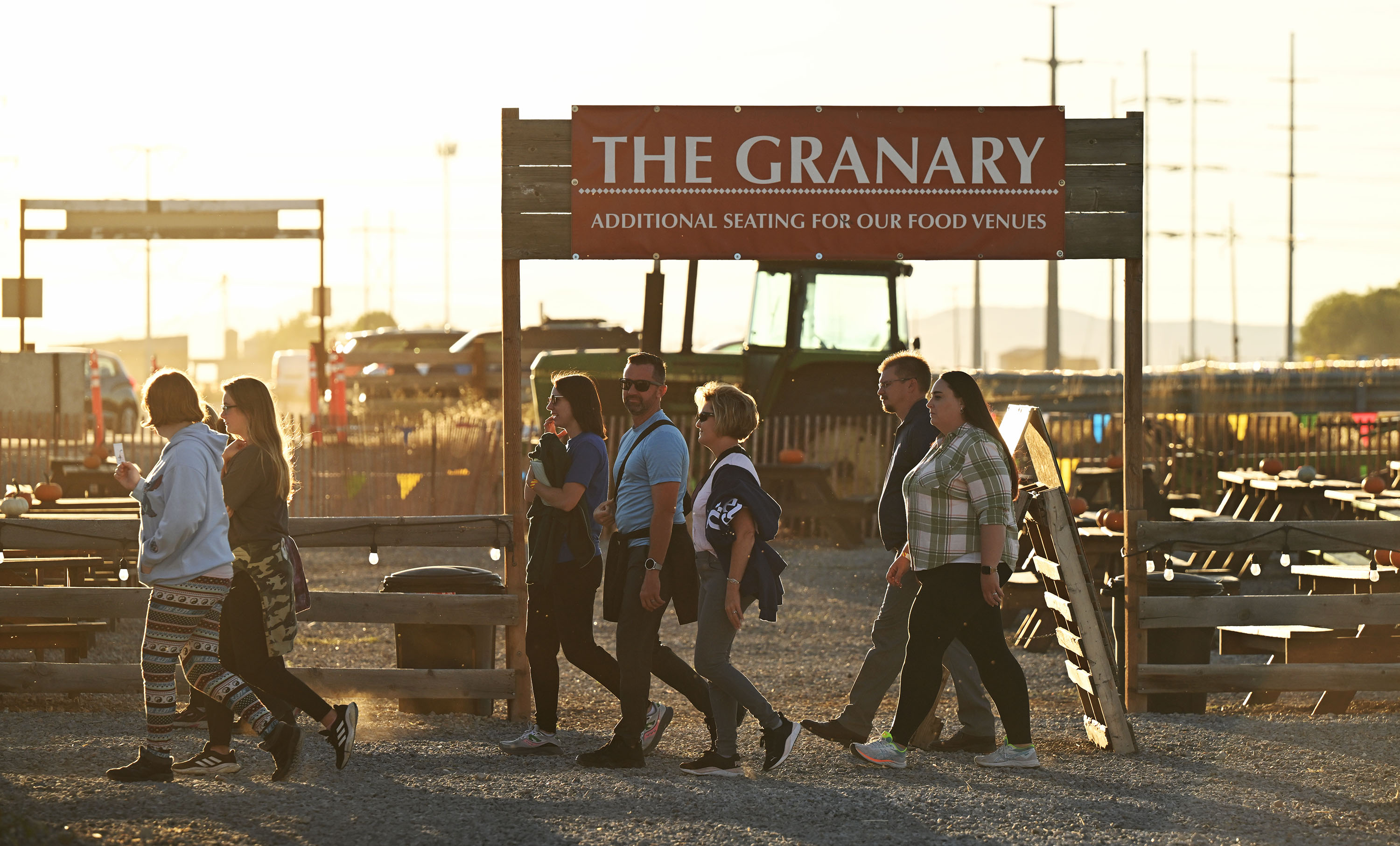 Guests walk into the Cross E Ranch during the Fall Festival in North Salt Lake on Sept. 24, 2024.