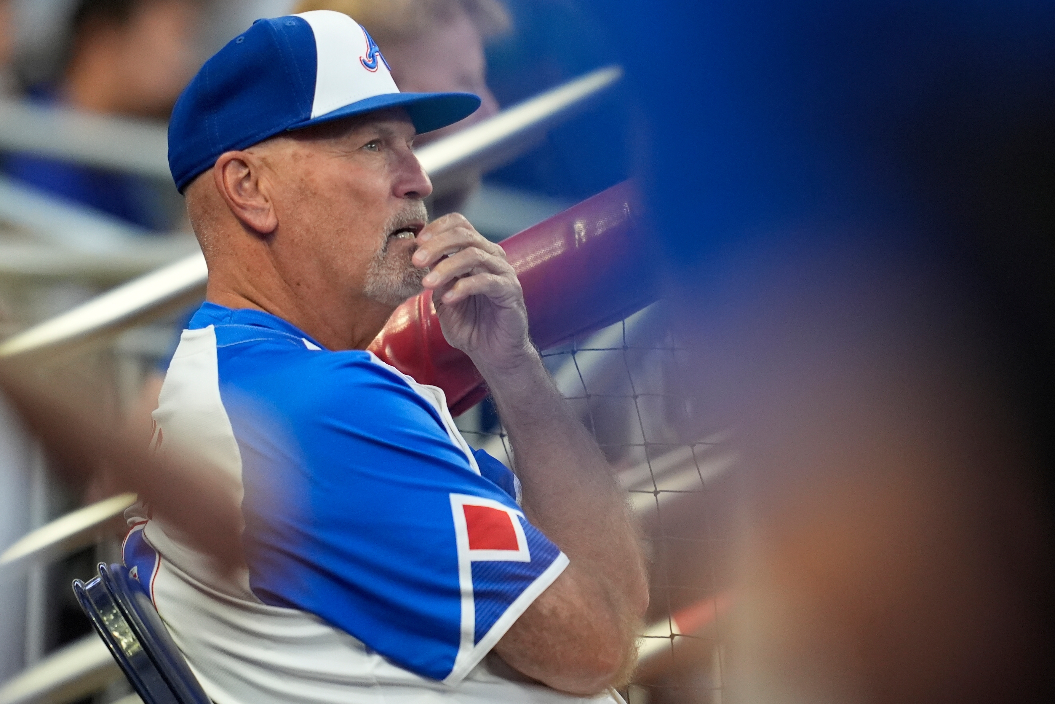Atlanta Braves manager Brian Snitker (43) sits in the dugout in the first inning of a baseball game against the Pittsburgh Pirates, Saturday, Sept. 27, 2025, in Atlanta. 