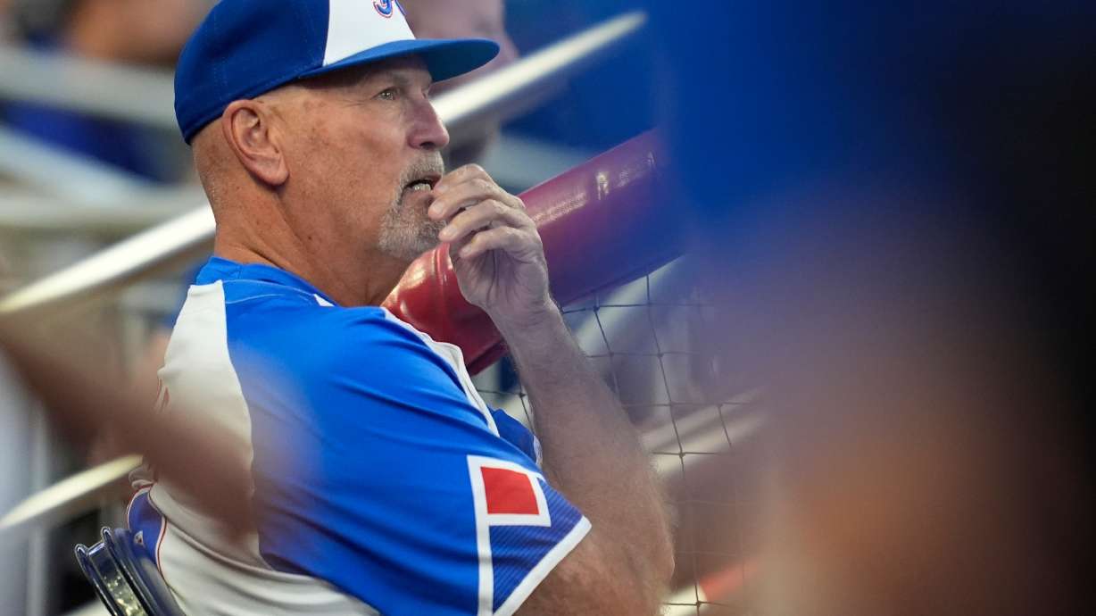 Atlanta Braves manager Brian Snitker (43) sits in the dugout in the first inning of a baseball game against the Pittsburgh Pirates, Saturday, Sept. 27, 2025, in Atlanta.