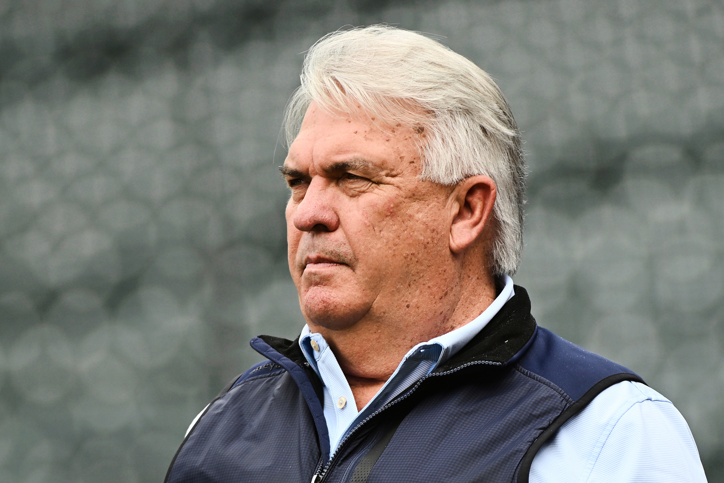 FILE - Colorado Rockies general manager Bill Schmidt watches batting practice prior to a baseball game against the Los Angeles Angels, Friday, Sept. 19, 2025, in Denver. 