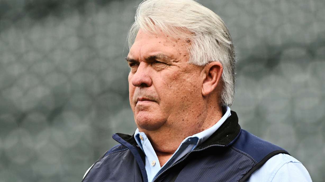 FILE - Colorado Rockies general manager Bill Schmidt watches batting practice prior to a baseball game against the Los Angeles Angels, Friday, Sept. 19, 2025, in Denver.