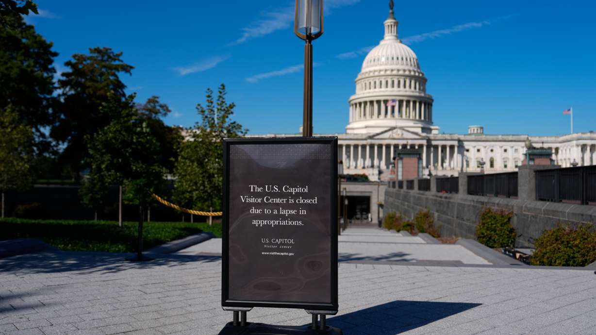 A sign announces that the U.S. Capitol Visitor Center is closed, on the first day of a partial government shutdown, Wednesday in Washington.