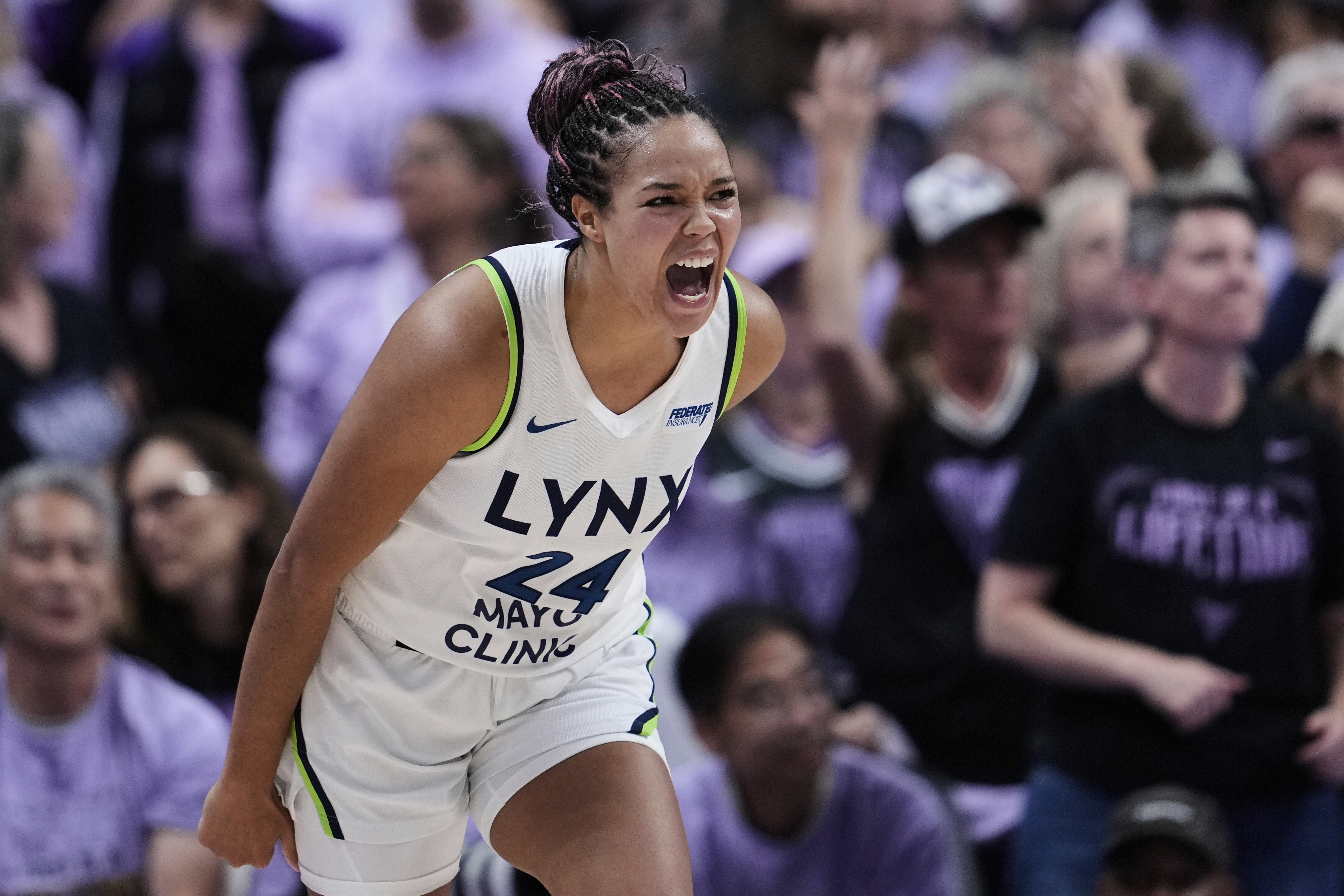 Minnesota Lynx forward Napheesa Collier celebrates after making a 3-point basket during the second half of Game 2 in the first round of the WNBA basketball playoffs against the Golden State Valkyries, Wednesday, Sept. 17, 2025, in San Jose, Calif. 