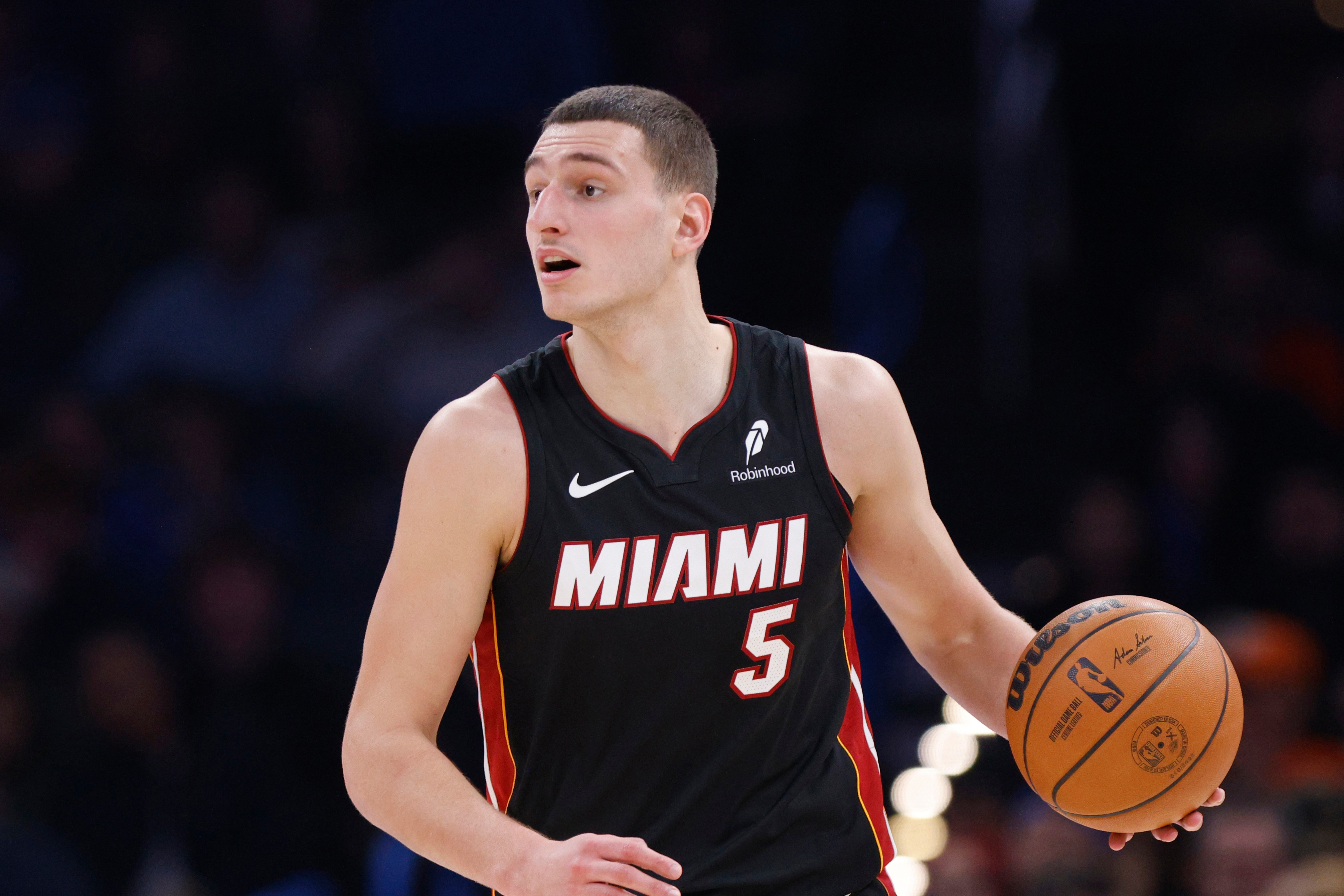 FILE - Miami Heat forward Nikola Jovic dribbles during the first half of an NBA basketball game against the Oklahoma City Thunder, Feb. 12, 2025, in Oklahoma City.