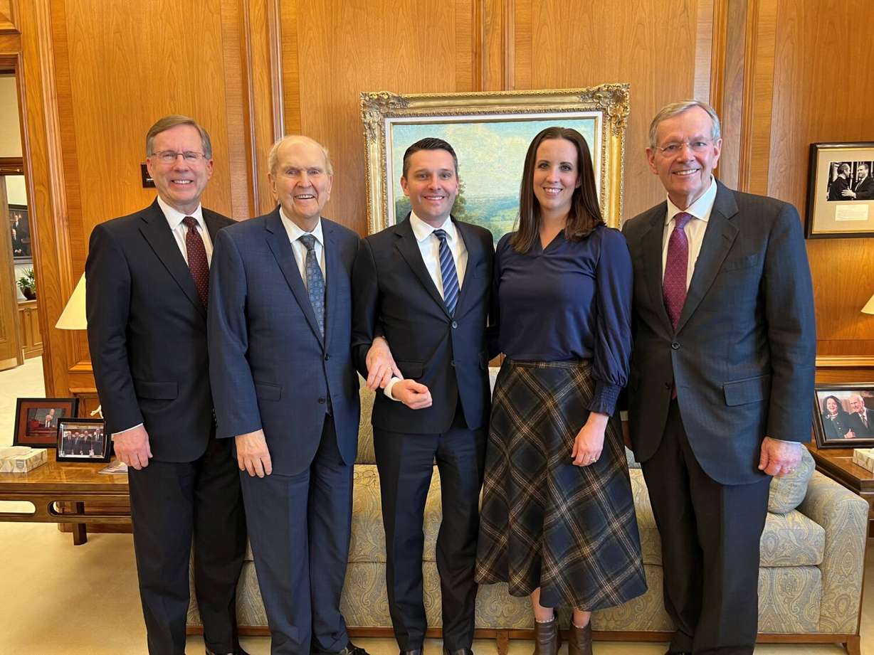 Derrick Porter and his wife, Rebecca, center, are pictured with President Russell M. Nelson in a 2024 photo.