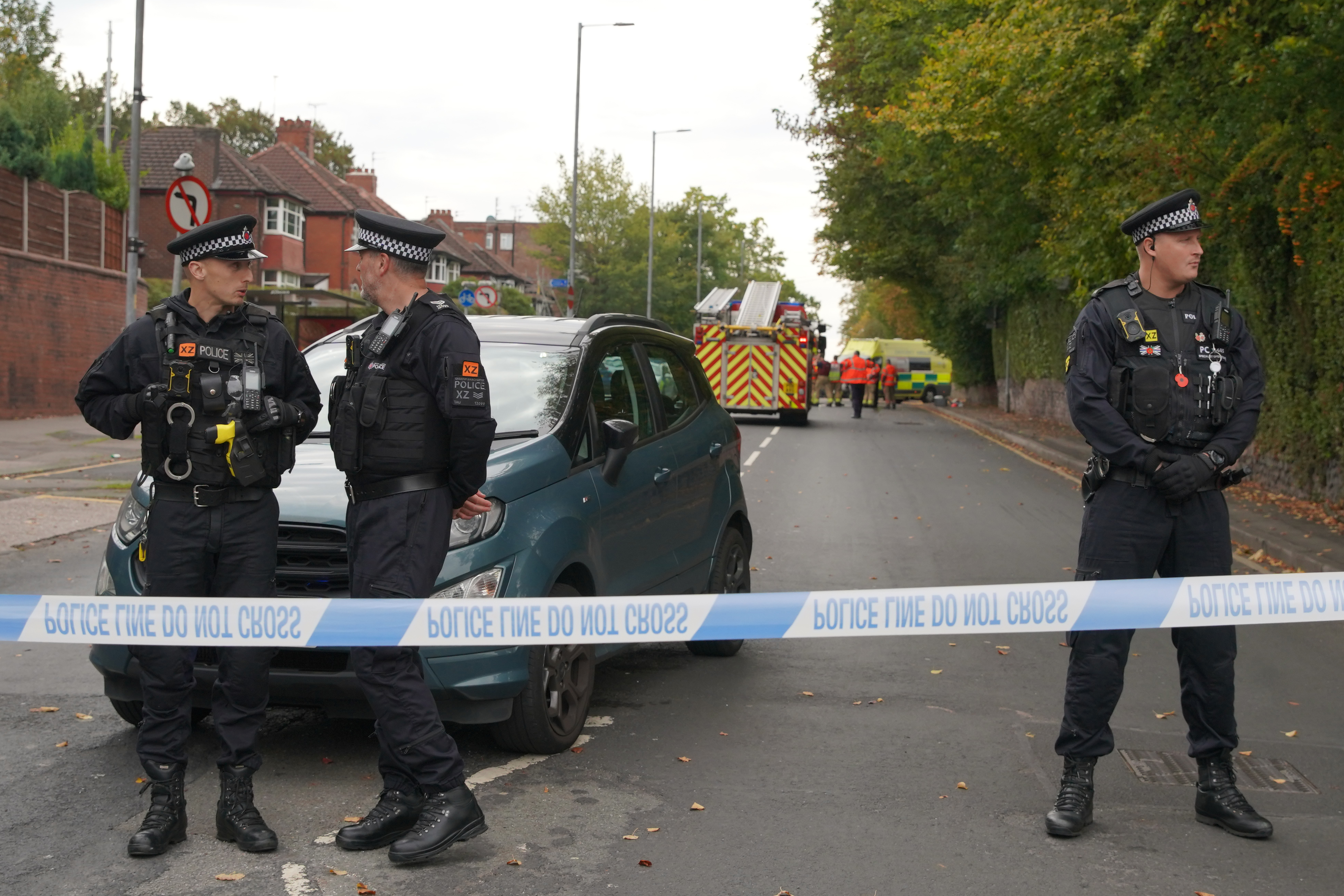 Police near the scene of a stabbing incident at Heaton Park Hebrew Congregation synagogue, in Crumpsall, Manchester, England, Thursday. Rabbi Jonathan Romain called the attack at the synagogue "a rabbi's worst nightmare."
