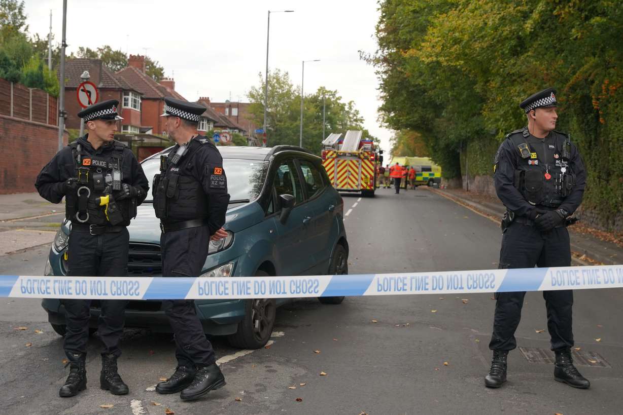 Police near the scene of a stabbing incident at Heaton Park Hebrew Congregation synagogue, in Crumpsall, Manchester, England, Thursday. Rabbi Jonathan Romain called the attack at the synagogue "a rabbi's worst nightmare."