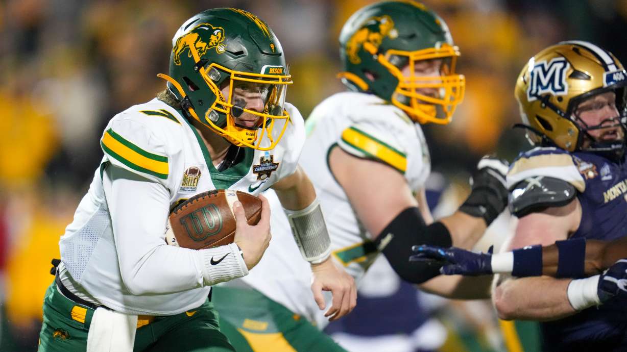 FILE - North Dakota State quarterback Cam Miller runs with the ball against Montana State during the first half of the FCS Championship NCAA college football game, Jan. 6, 2025, in Frisco, Texas.