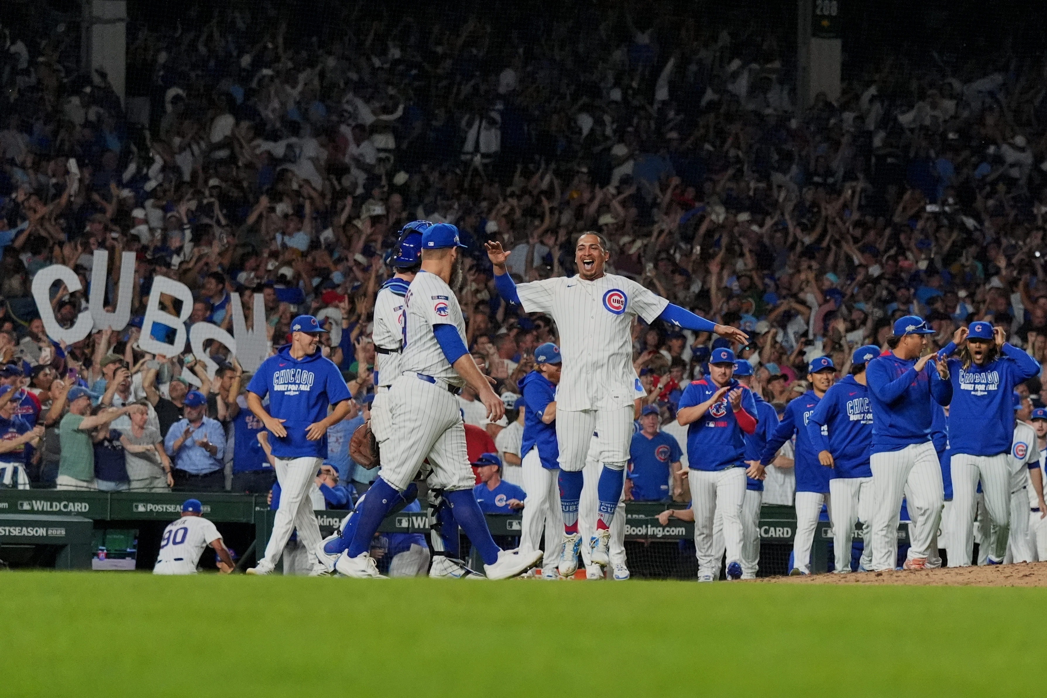 The Chicago Cubs celebrate after Game 3 of a National League wild card baseball game against the San Diego Padres Thursday, Oct. 2, 2025, in Chicago. 