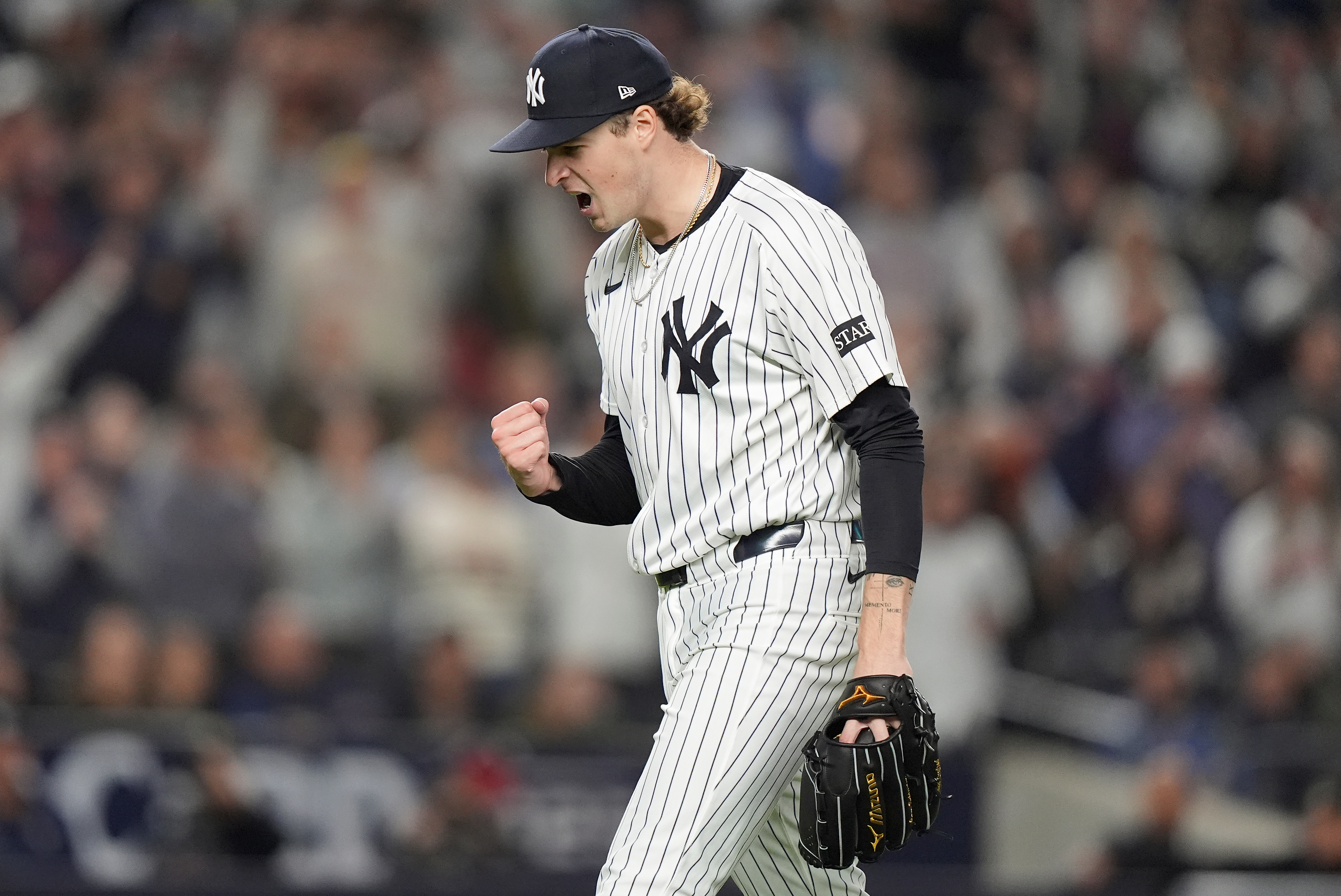 New York Yankees pitcher Cam Schlittler reacts as he walks off the field at the end of the top of the eighth inning of Game 3 of an American League wild-card baseball playoff series against the Boston Red Sox, Thursday, Oct. 2, 2025, in New York. 