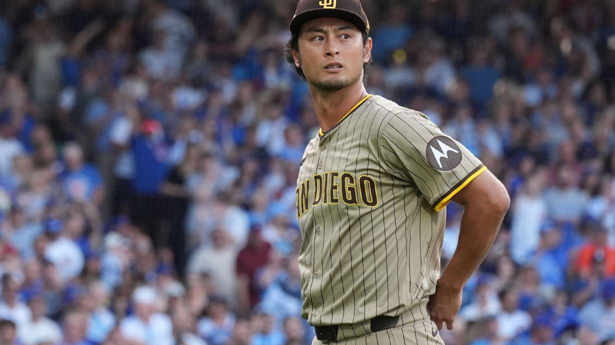 San Diego Padres' Yu Darvish leaves the game during the second inning of Game 3 of a National League wild card baseball game against the Chicago Cubs Thursday, Oct. 2, 2025, in Chicago.