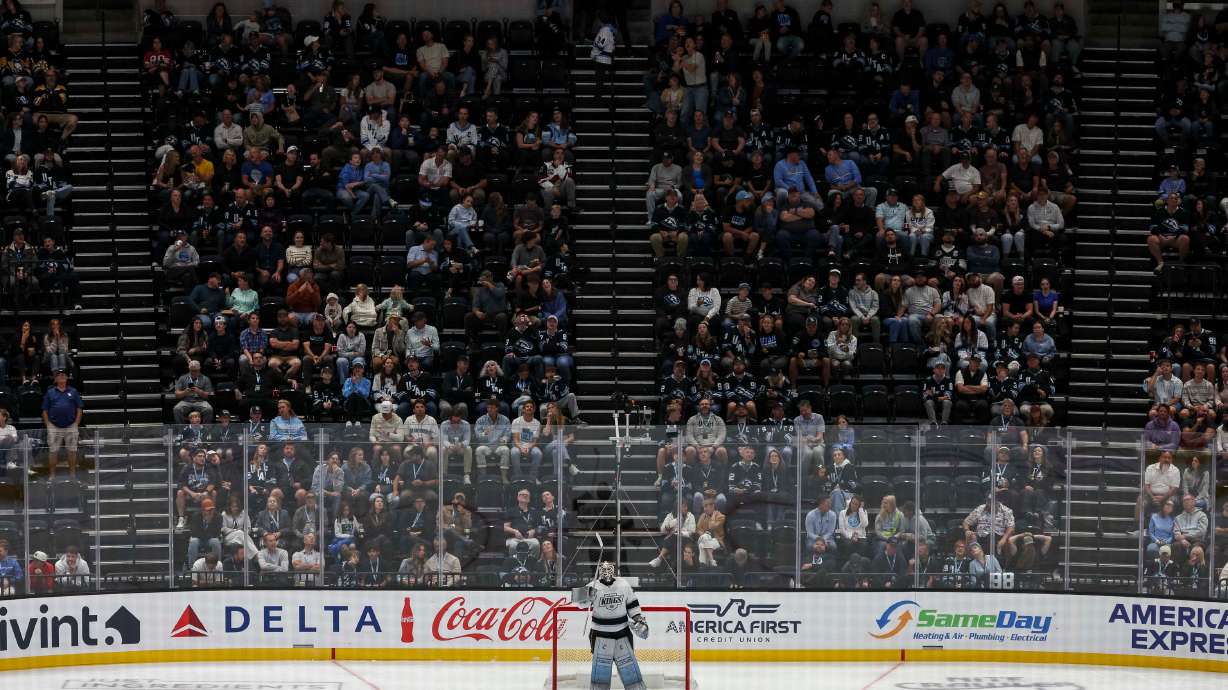 Los Angeles Kings goaltender Anton Forsberg (31) raises his stick during a break in play during an NHL preseason game against the Utah Mammoth at the Delta Center in Salt Lake City on Thursday, Oct. 2, 2025.