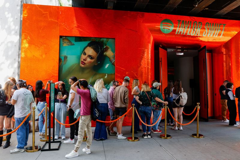 People wait to enter a Spotify pop-up event for Taylor Swift’s album "The Life of a Showgirl" in New York City on Sept. 30.