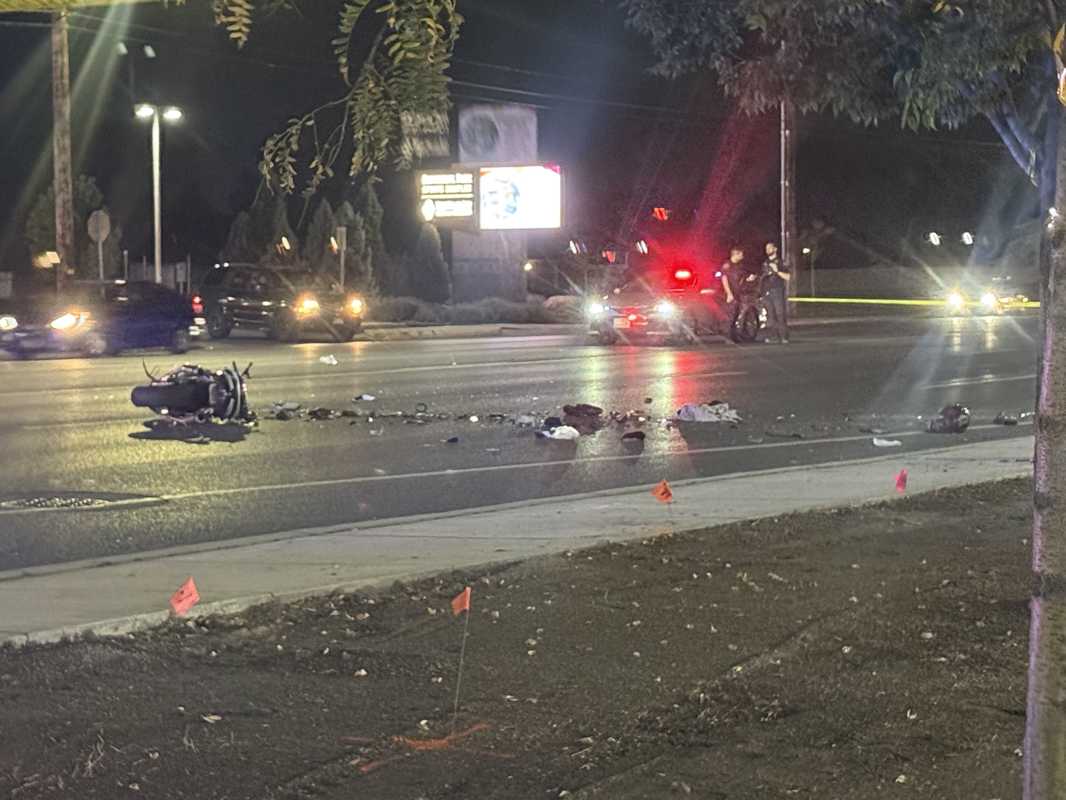 The scene of a collision between a motorcyclist and a vehicle in West Valley, Thursday. The motorcyclist was taken to the hospital in extremely critical condition.