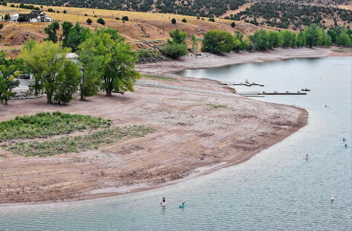 A large area of beach is pictured at Echo Reservoir in Coalville on Aug. 22. The U.S. Drought Monitor reports 100% of Utah is abnormally dry and nearly 76% of the state is in severe drought.
