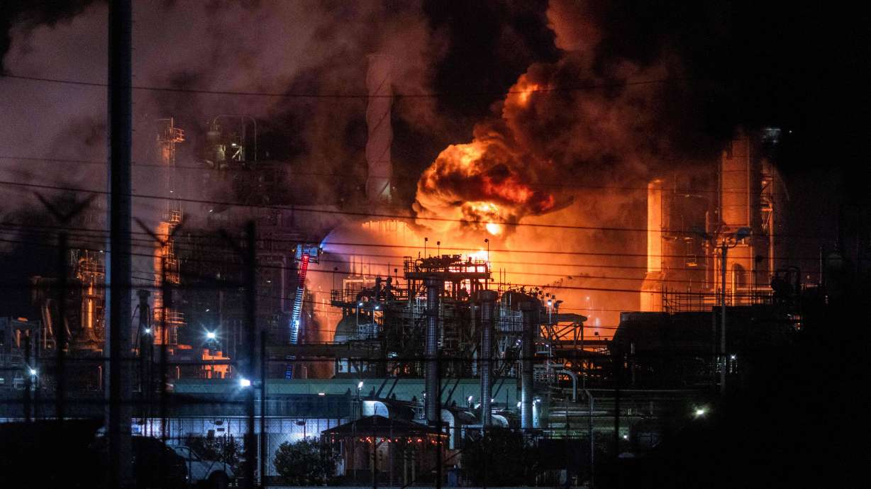 Flames rise from the Chevron refinery in El Segundo, Calif., Thursday. Firefighters were able fully extinguish the blaze and reopen all affected roads Friday.