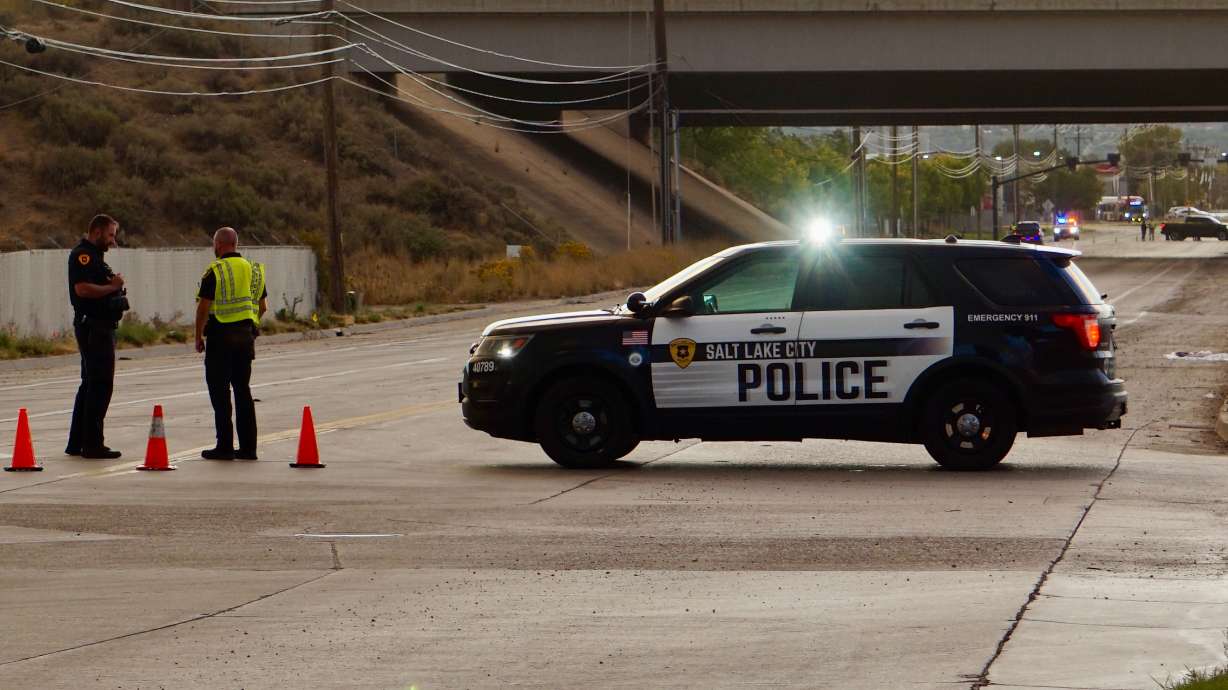 Police investigate after a pedestrian was hit by a car in a crosswalk near 1950 W. 500 South in Salt Lake City on Friday. The man was hospitalized in critical condition and later died.