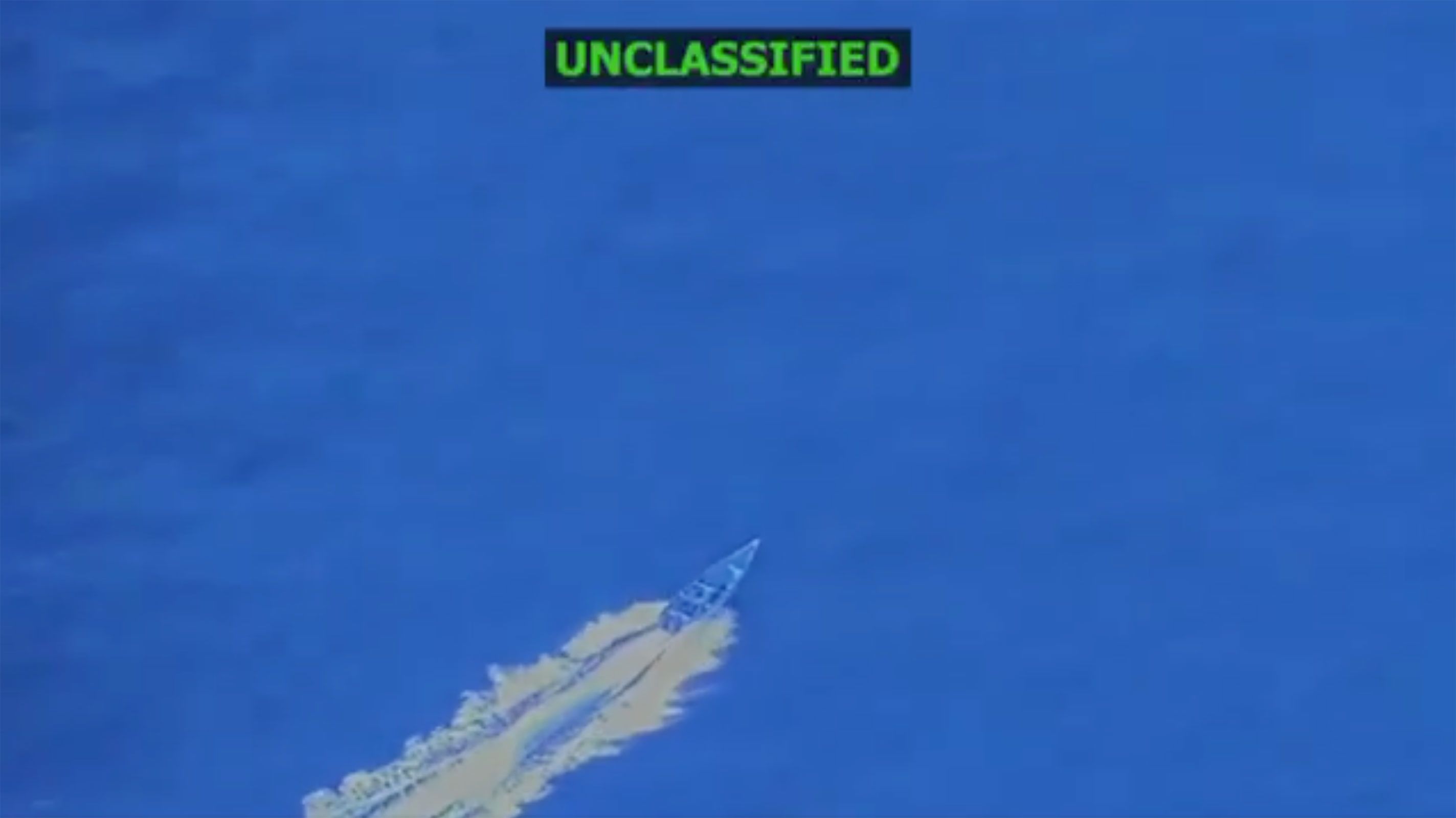 In this screengrab taken from a video posted by Defense Secretary Pete Hegseth on Friday, a boat is visible just before it is hit by a military strike, off the coast of Venezuela. In his post, Hegseth said the boat was trafficking narcotics and that four men onboard were killed.