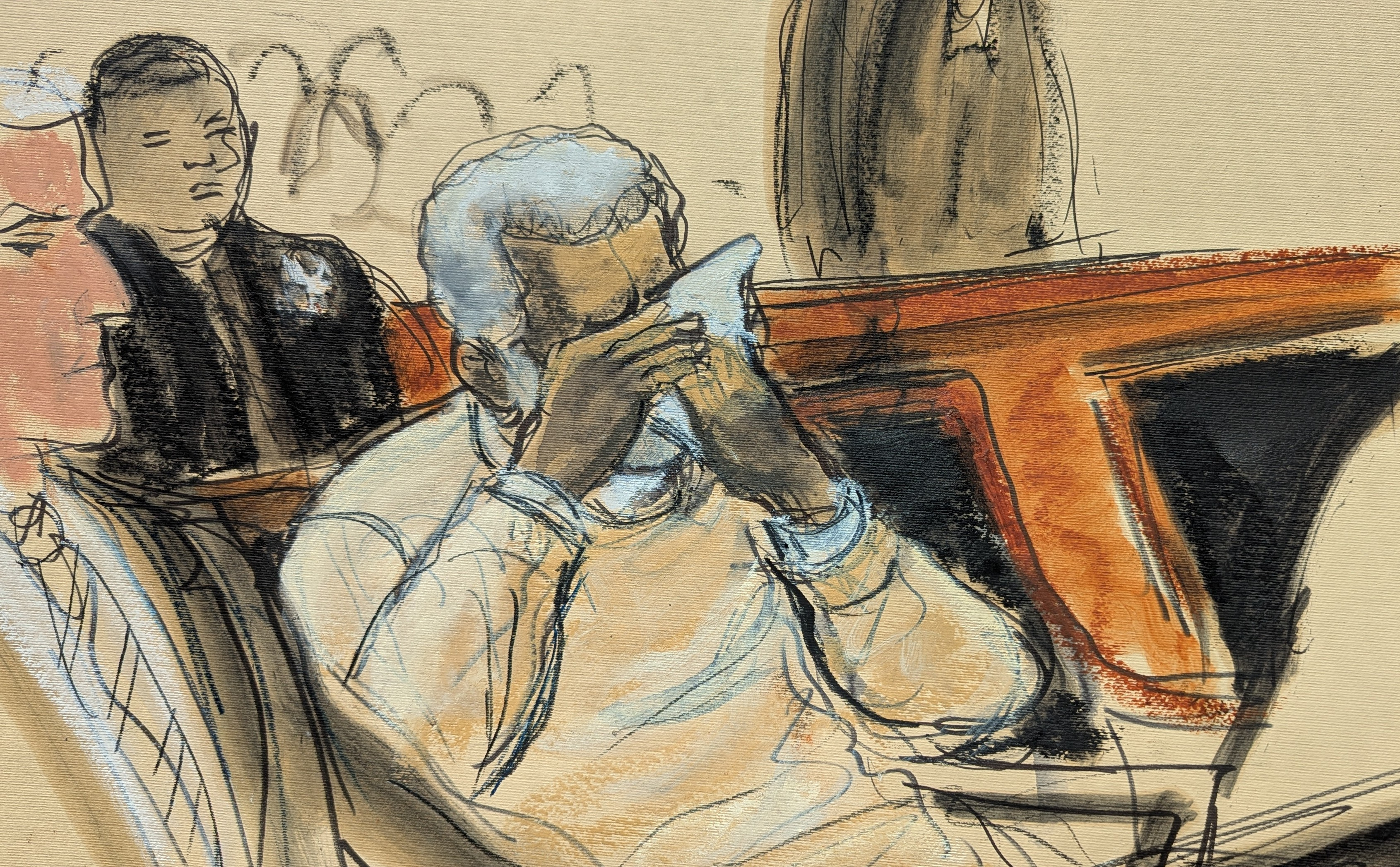 Sean "Diddy" Combs cries during the playing of a video about his life during his sentencing hearing in Manhattan federal court, Friday, in New York. Combs apologized to his family as he left the courtroom following his sentencing to 50 months in prison.