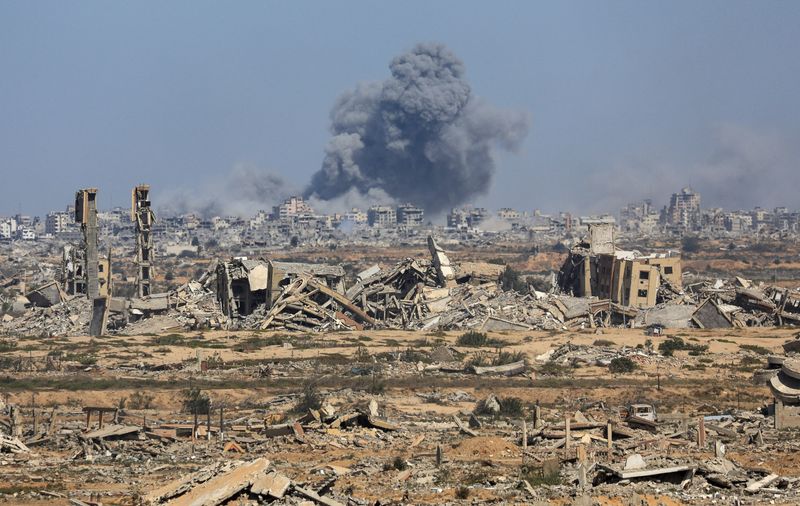 Smoke rises during an Israeli military operation in Gaza City, as seen from the central Gaza Strip, Thursday. Hamas said on Friday it would agree to parts of President Donald Trump's plan to end the war in Gaza, though it seeks further negotiations.
