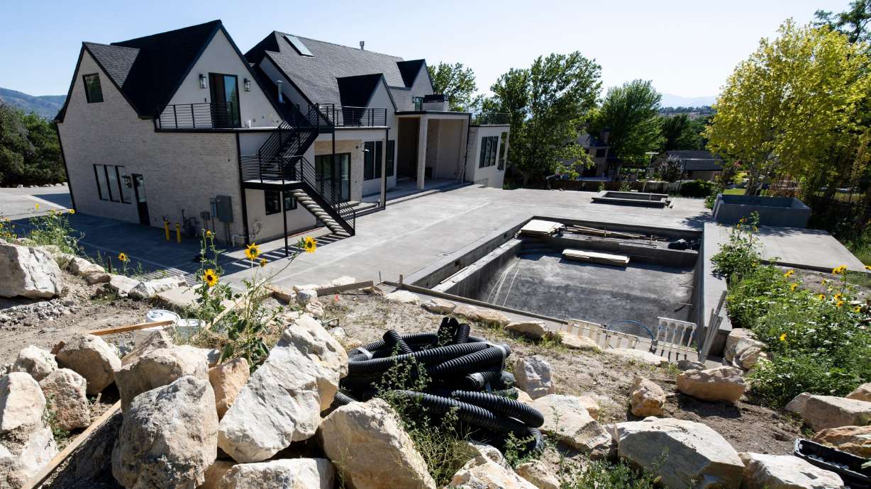 A house under construction in Draper is pictured on July 10. So far, mortgage rates aren't moving much as the impasse that shuttered the federal government continues.