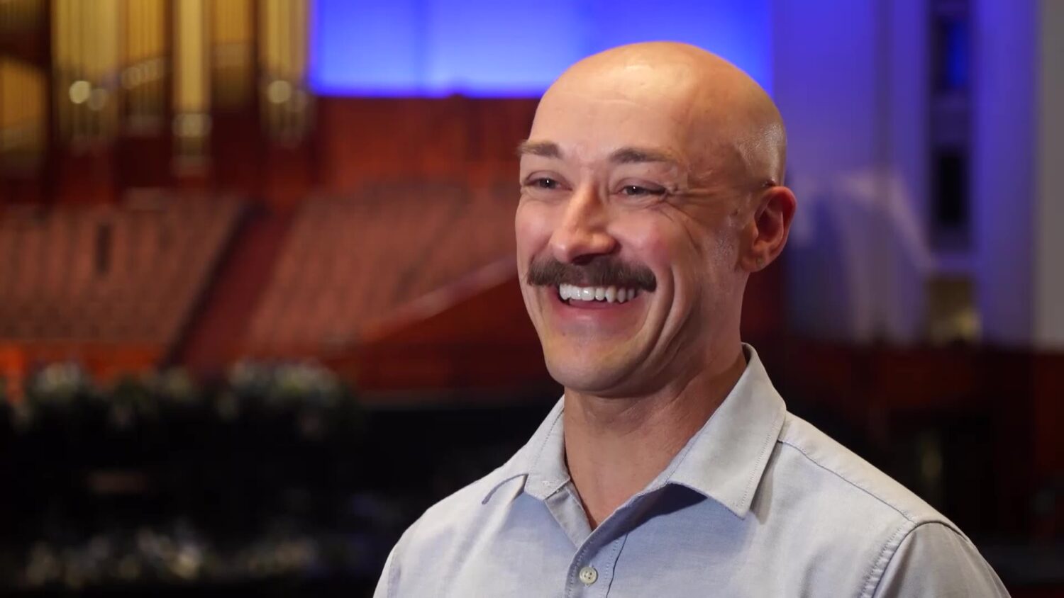 Andrew Barnett speaks with KSL-TV, Thursday. Barnett, who is a church florist as well as singer in the Tabernacle Choir, is making sure floral arrangements are perfect.